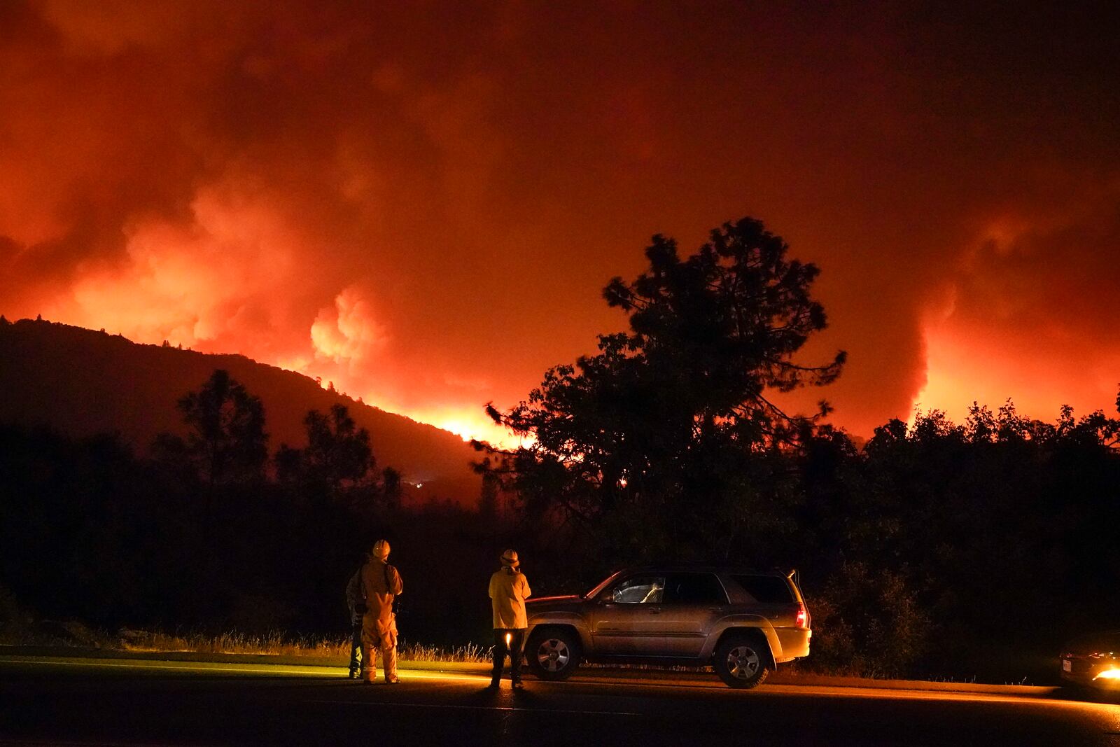 The Creek Fire burns on a ridge top along Highway 168 Tuesday, Sept. 8, 2020, near Alder Springs, Calif. (AP Photo/Marcio Jose Sanchez)