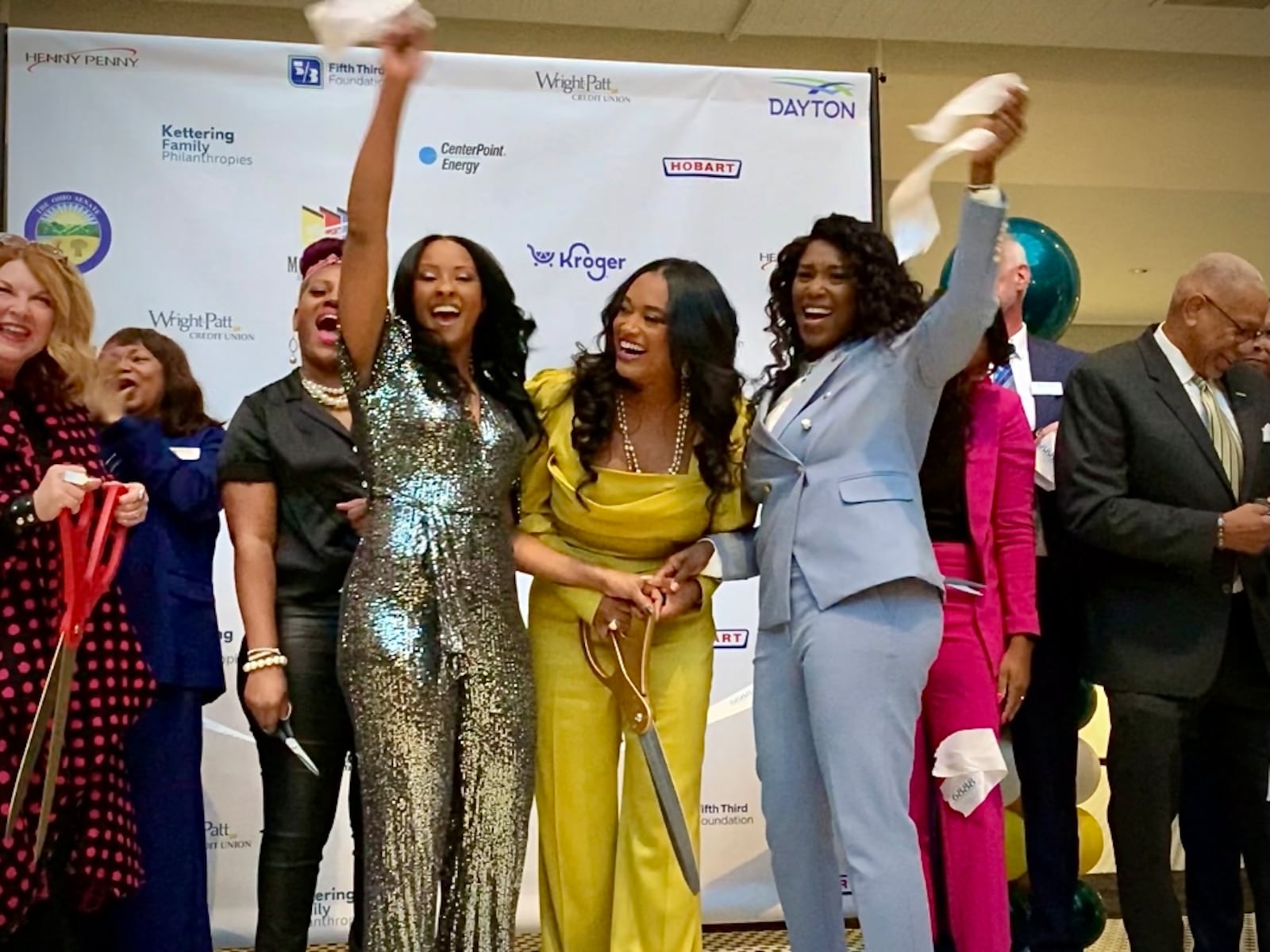 6888 Kitchen incubator held its soft opening Thursday evening, Feb. 29, 2024. Founders Dabriah Rice, Jamaica White, and Charlynda Scales (center) celebrate. LONDON BISHOP/STAFF 