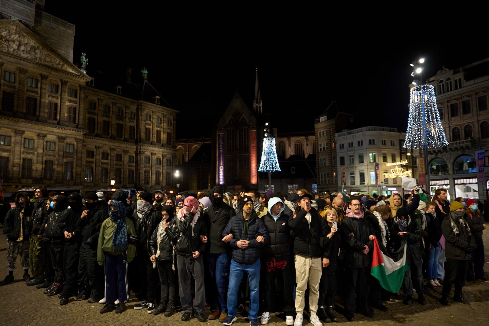 Pro-Palestinian supporters protest in Amsterdam, Netherlands, Wednesday, Nov. 13, 2024, despite a city ban on such gatherings. (AP Photo/Bram Janssen)