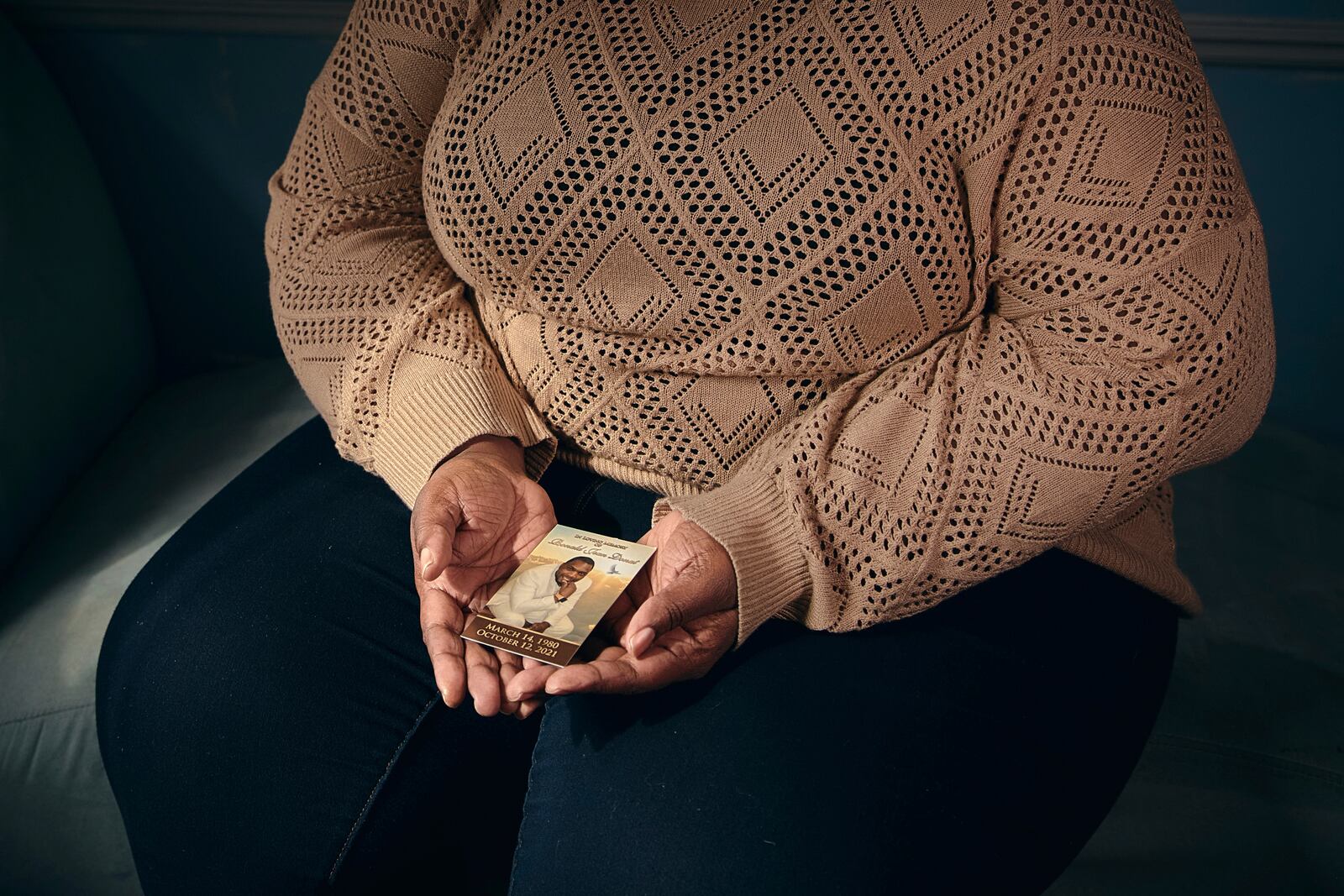 Sharline Volcy holds a picture of her husband, Ronald Donat, Monday, Feb. 3, 2025, in Orange, N.J. (AP Photo/Andres Kudacki)