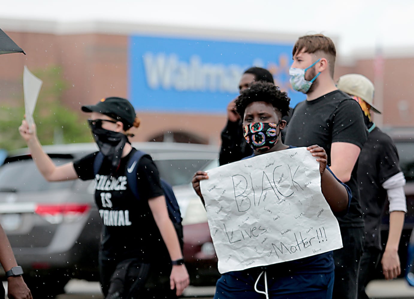 PHOTOS: Demonstrators rally for justice in Beavercreek