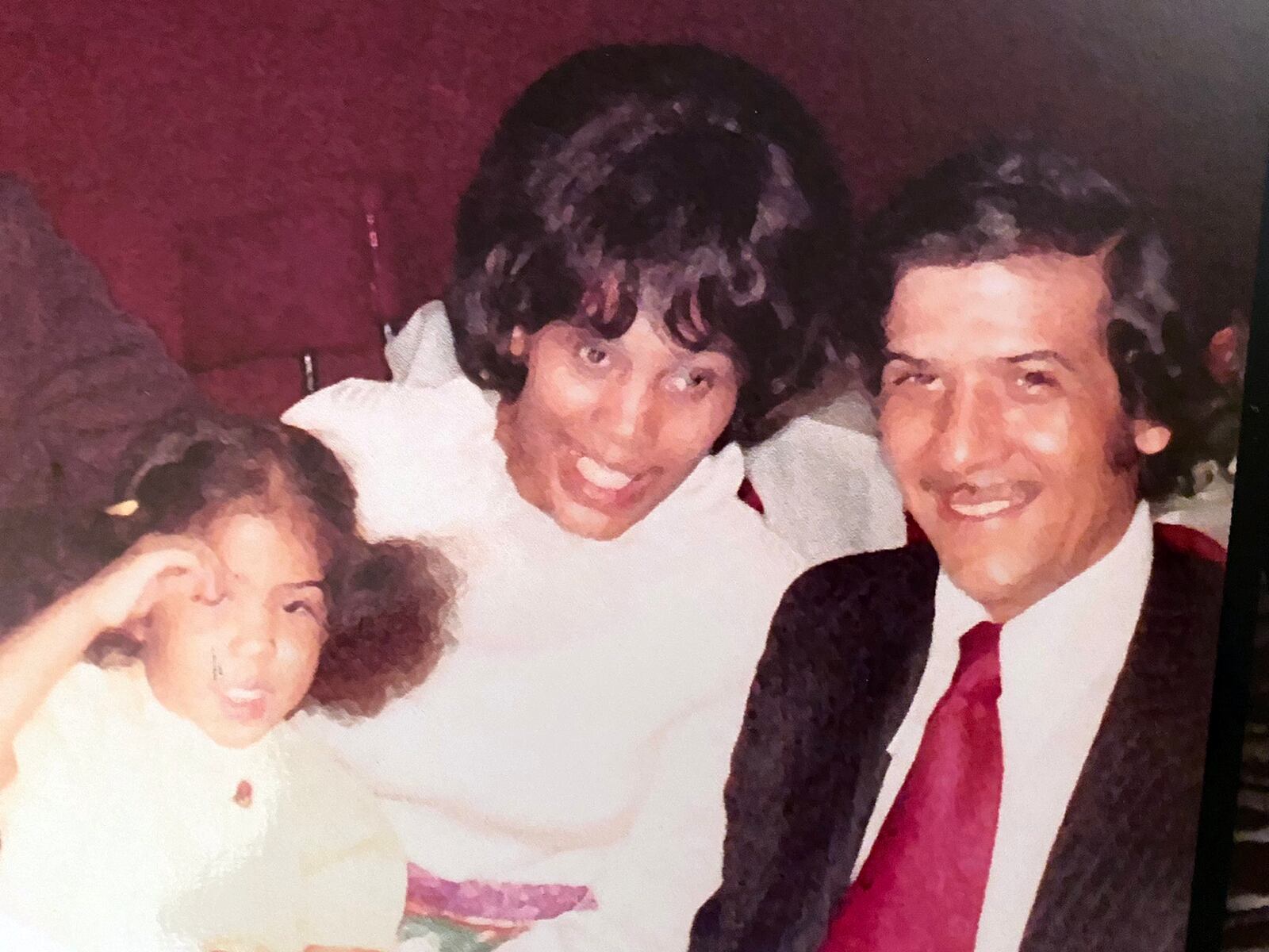 Growing up surrounded by cars, Jenell Ross learned about the business from childhood. She is shown as a young girl with her parents (Center) Norma J. Ross and (Right) and Robert P. Ross Sr. CONTRIBUTED