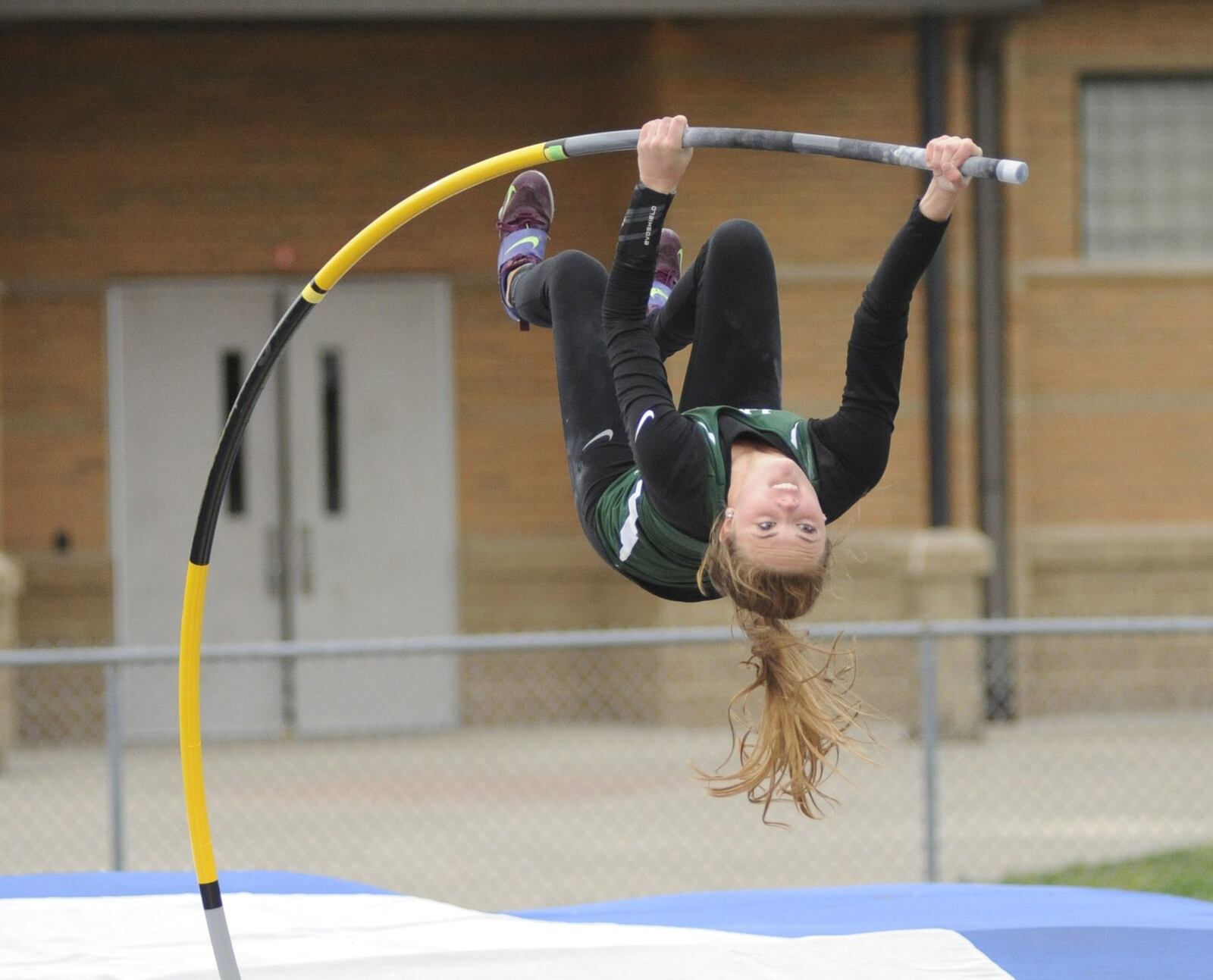 Greenville junior Riley Hunt set a state pole vault record (13-6) during Wednesday’s divisional championship and added a GWOC track and field championship (13-2) at Troy’s Memorial Stadium on Friday, May 10, 2019. MARC PENDLETON / STAFF