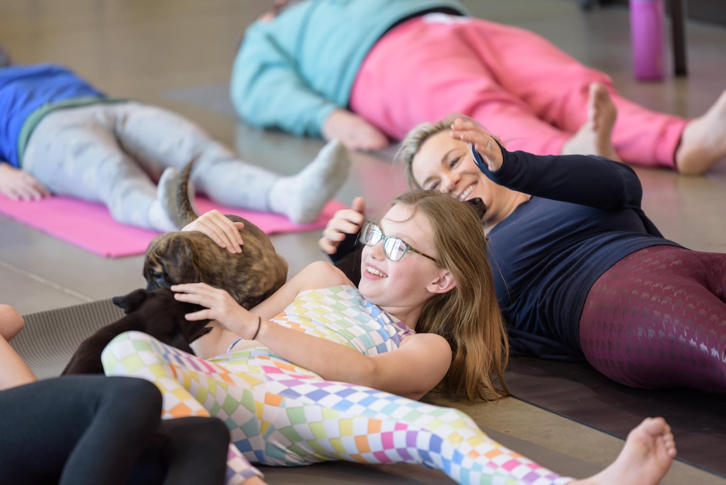 PHOTOS: Puppy Yoga at SICSA Pet Adoption and Wellness Center