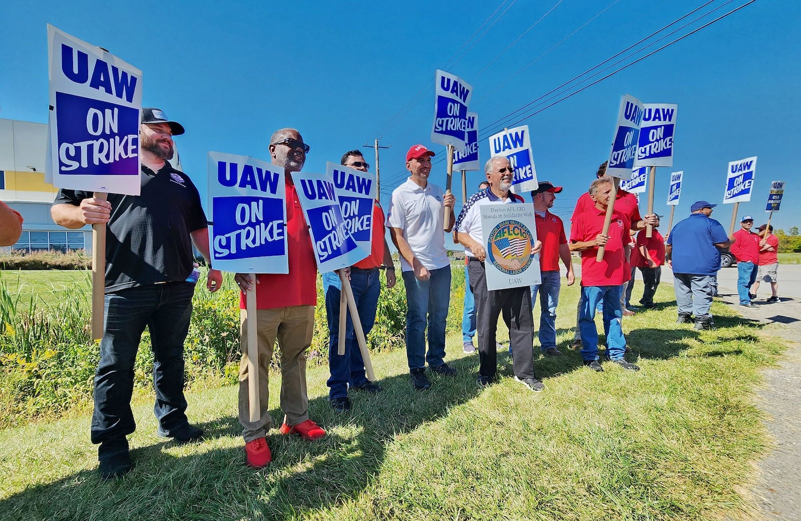 Members and supporters of Dayton's AFL-CIO union joined striking UAW Local 674 workers on the picket line in solidarity Tuesday, Oct. 3, 2023 West Chester Township. The UAW 674 members are on strike at the General Motors Parts Distribution Center on Jacquemin Drive. NICK GRAHAM/STAFF