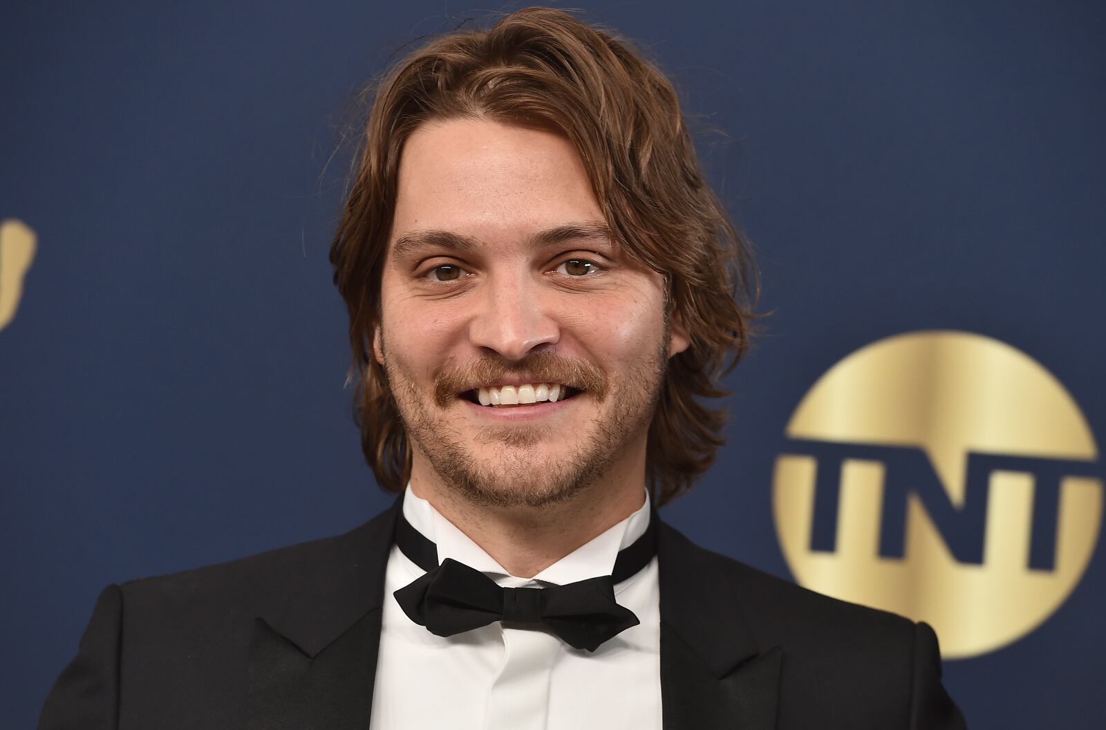 Luke Grimes arrives at the 28th annual Screen Actors Guild Awards at the Barker Hangar on Sunday, Feb. 27, 2022, in Santa Monica, Calif. (Photo by Jordan Strauss/Invision/AP)