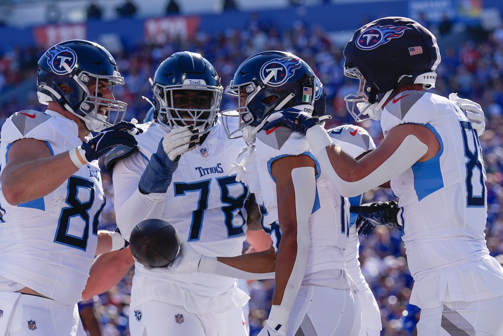 Tennessee Titans wide receiver Nick Westbrook-Ikhine, second from right, celebrates a touchdown with teammates during the first half of an NFL football game against the Buffalo Bills, Sunday, Oct. 20, 2024, in Orchard Park, N.Y. (AP Photo/Charles Krupa)