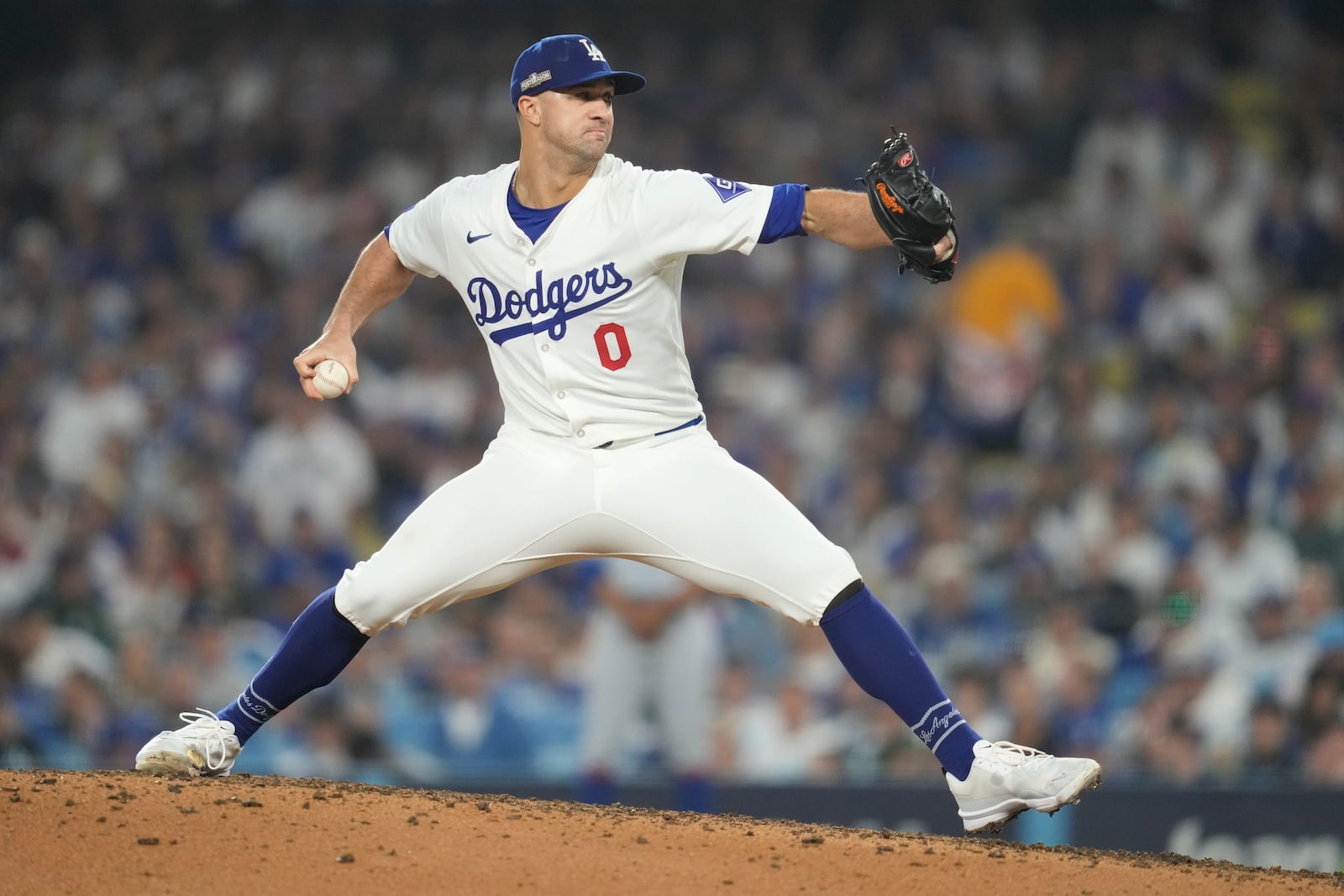 Los Angeles Dodgers pitcher Jack Flaherty throws during the seventh inning in Game 1 of a baseball NL Championship Series against the New York Mets, Sunday, Oct. 13, 2024, in Los Angeles. (AP Photo/Ashley Landis)