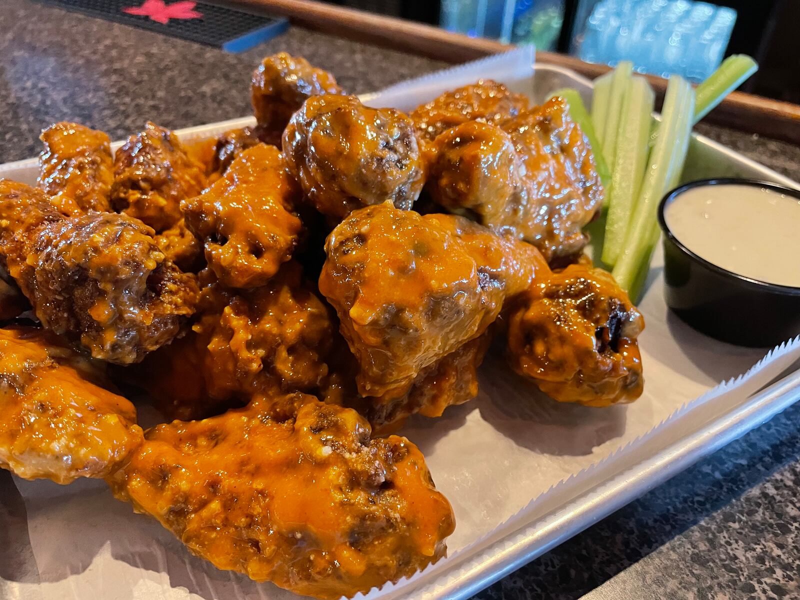 Archer’s Tavern is located at 9496 Dayton-Lebanon Pike in Centerville and 2030 E. Dorothy Lane in Kettering. Pictured is their Archer's Style wings (NATALIE JONES/STAFF)