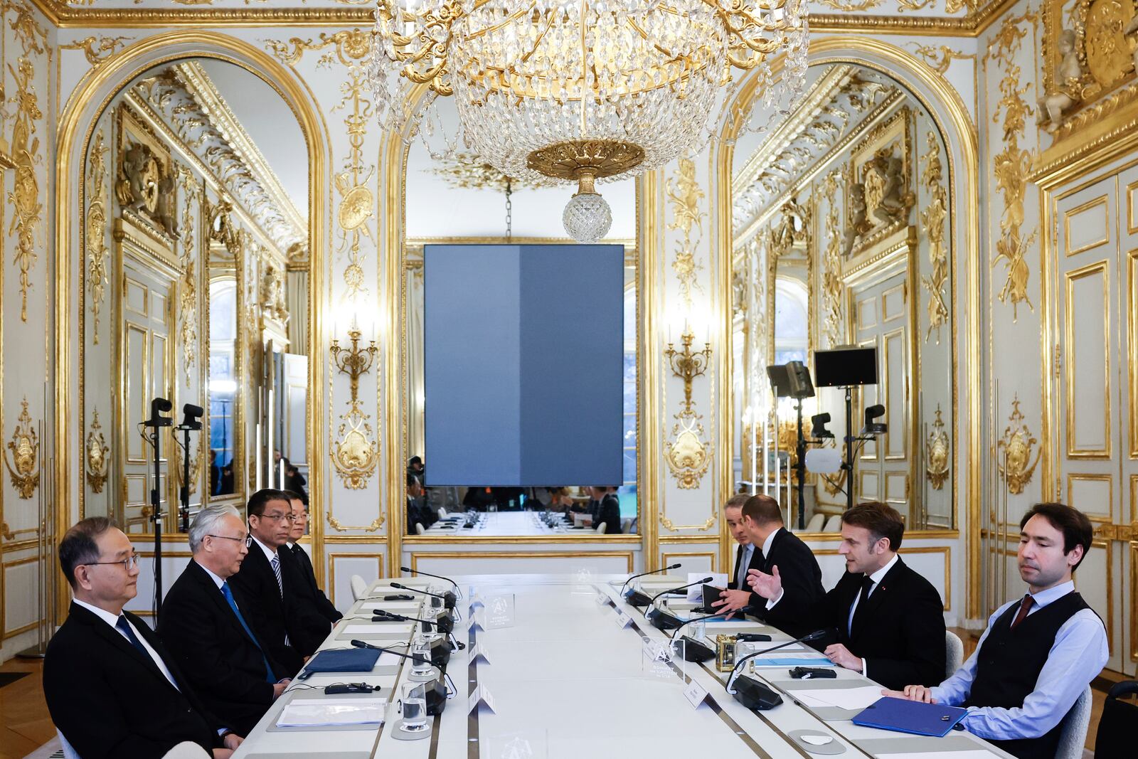 French President Emmanuel Macron, second right, meets with China's Vice Premier Zhang Guoqing, second left, at the Elysee Palace during events on the sidelines of an Artificial Intelligence Action Summit in Paris, Monday, Feb. 10, 2025. (Mohammad Badra, Pool Photo via AP)