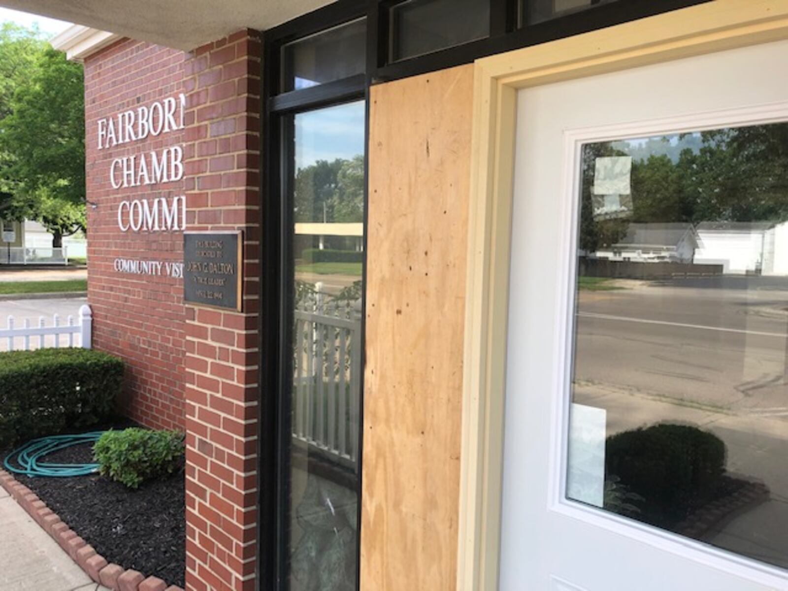 Repairs around the front door of the Fairborn Area Chamber of Commerce could be seen after a vehicle crashed into the Fairborn Veterans Memorial. It could not be confirmed Sunday if the work was due to the wreck. NICK BLIZZARD/STAFF