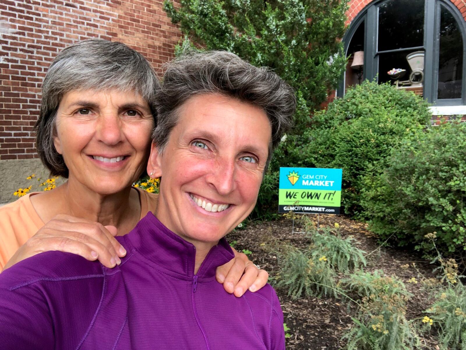 Carrie Scarff (left) and her wife, Aimee Noel. Scarff is vice president of the board of the Gem City Market and the chief of planning and projects for Five Rivers MetroParks. CONTRIBUTED PHOTO