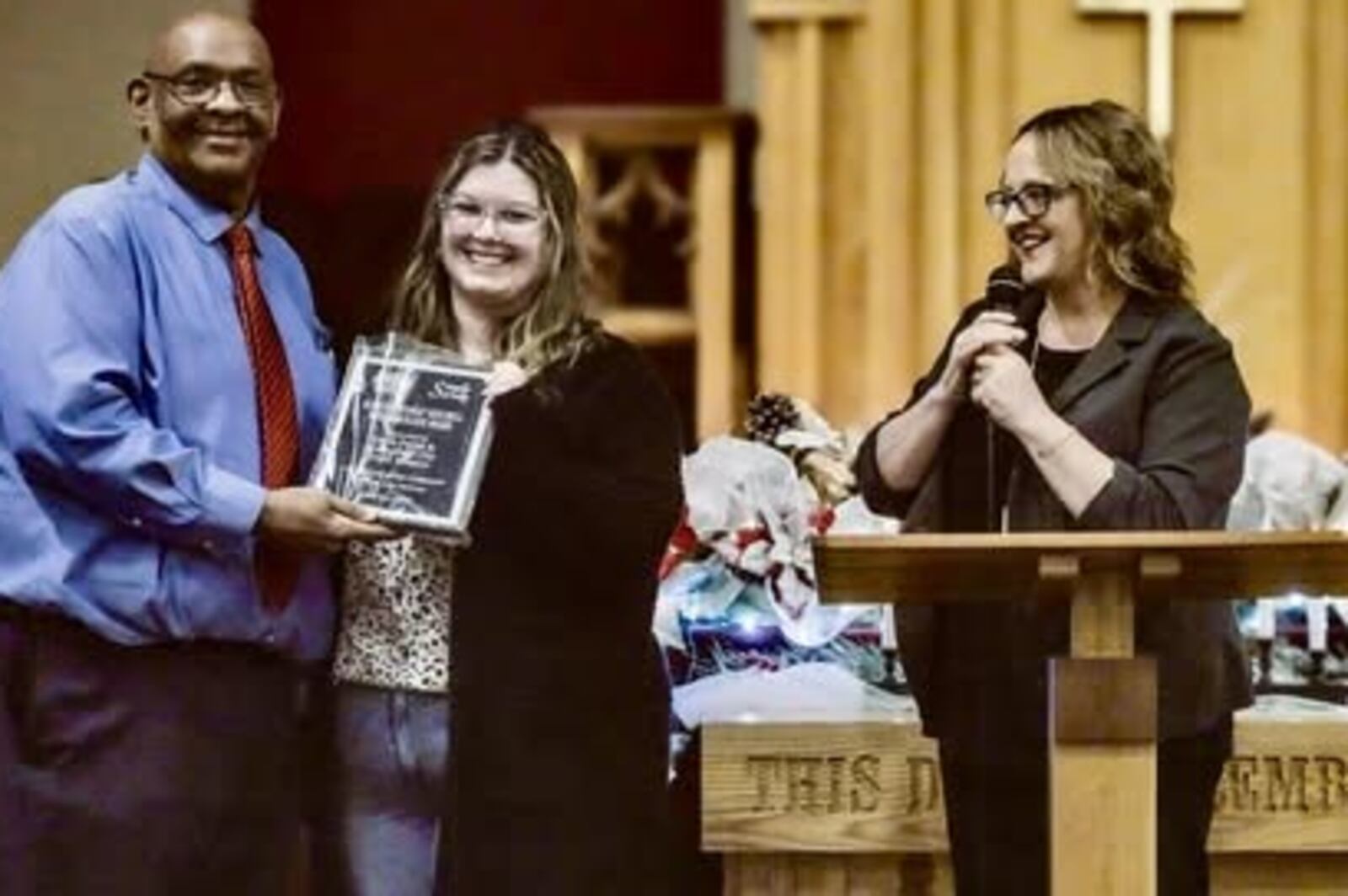 Julius Bailey, award winner, Eryca Payne of Springfield City Youth Mission and Amy Willmann of Nehemiah Foundation at the 2024 Simply Serving event. Contributed