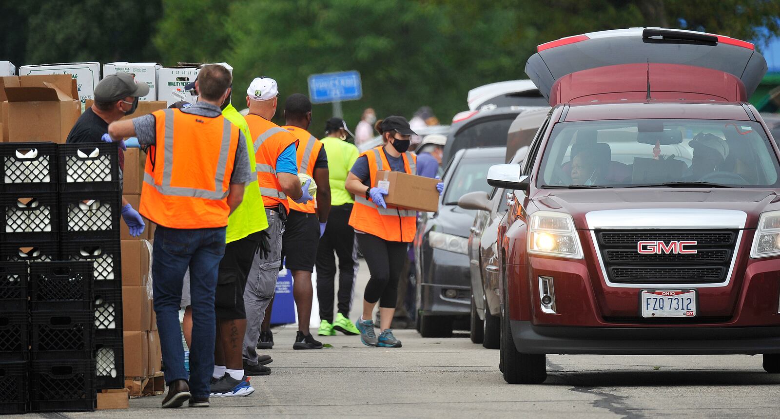 The Foodbank held it's mass food distribution Thursday at the Welcome Stadium. MARSHALL GORBY\STAFF