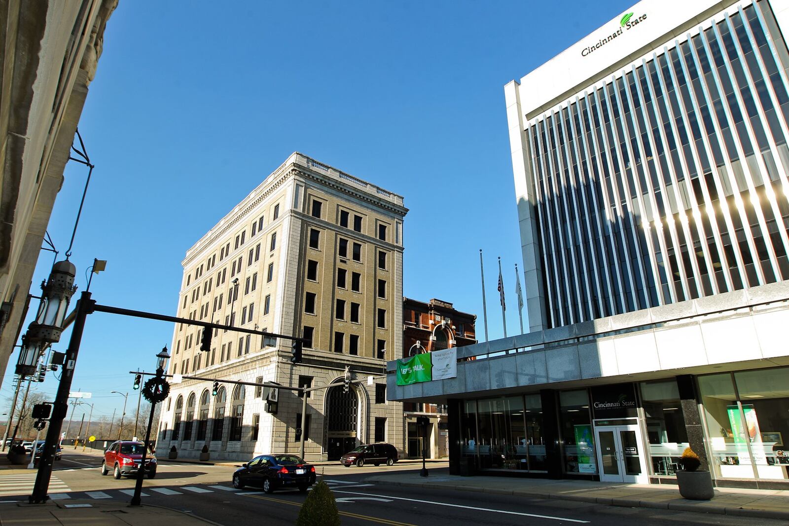 Cincinnati States Board of Trustees have voted to transfer the 2 N. Main St. building, at center, back to the city of Middletown. The May 28 decision still needs to be reviewed by the Ohio Auditor of State’s and Ohio Attorney General offices before a deed can by signed by Ohio Gov. Mike DeWine to make the transfer official. FILE PHOTO CUTLINE