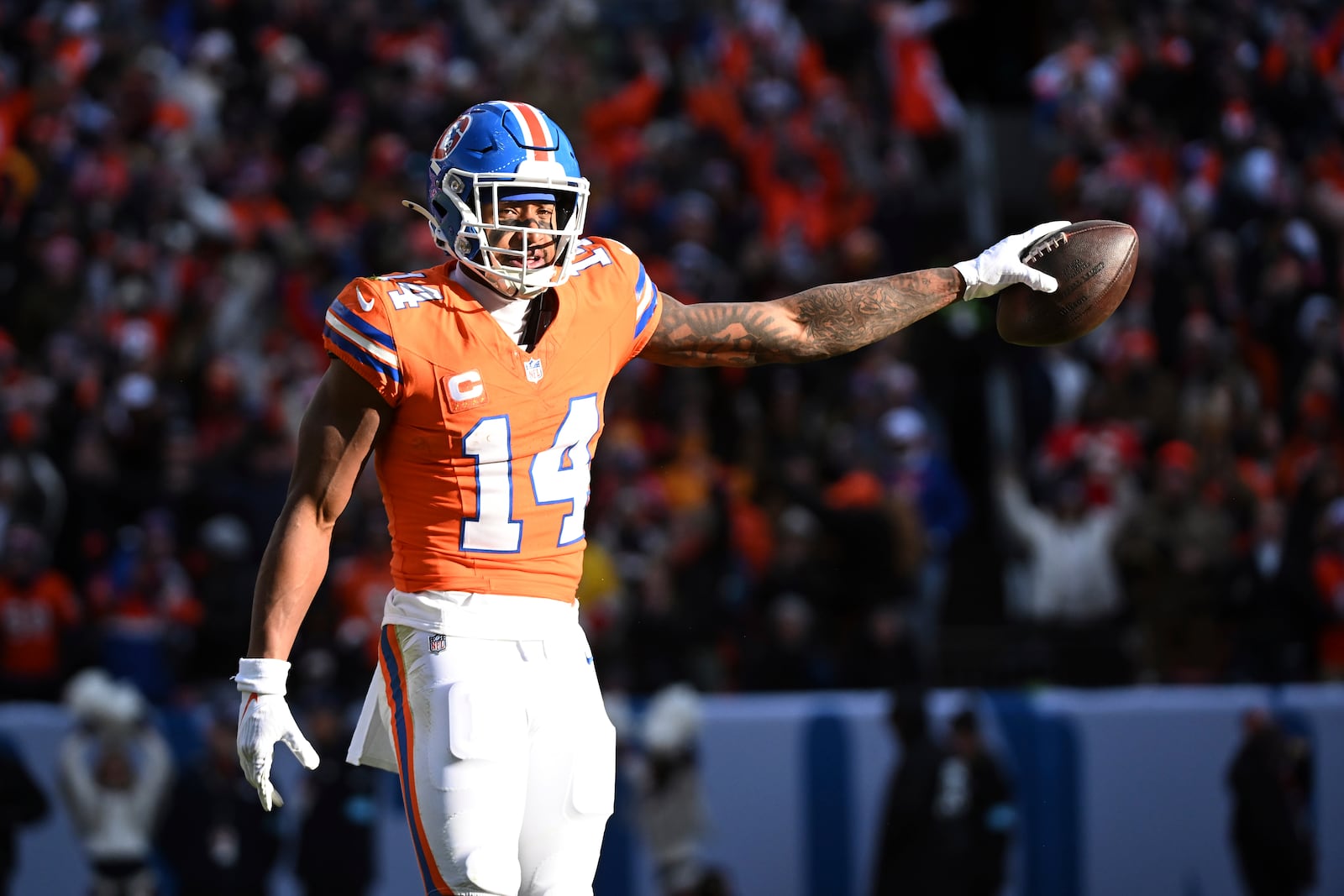 Denver Broncos wide receiver Courtland Sutton (14) celebrates after catching a pass during the first half of an NFL football game against the Kansas City Chiefs Sunday, Jan. 5, 2025, in Denver. (AP Photo/Geneva Heffernan)