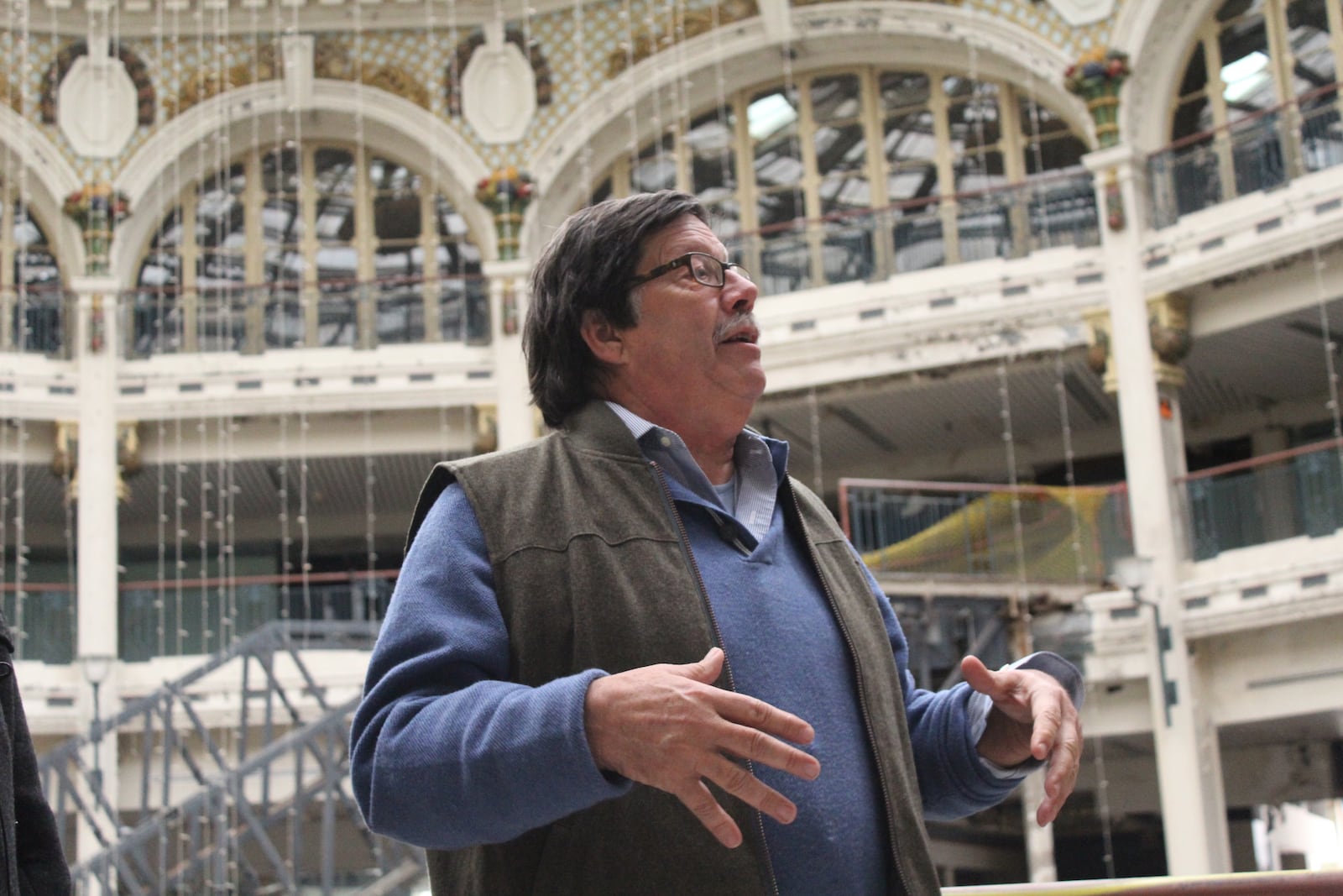 Bill Struever, with Maryland firm Cross Street Partners, discusses plans for the Dayton Arcade during a tour of the rotunda. Plans for the complex include housing, artist and creative spaces, a brewery, shops, restaurants and a boutique hotel. CORNELIUS FROLIK / STAFF