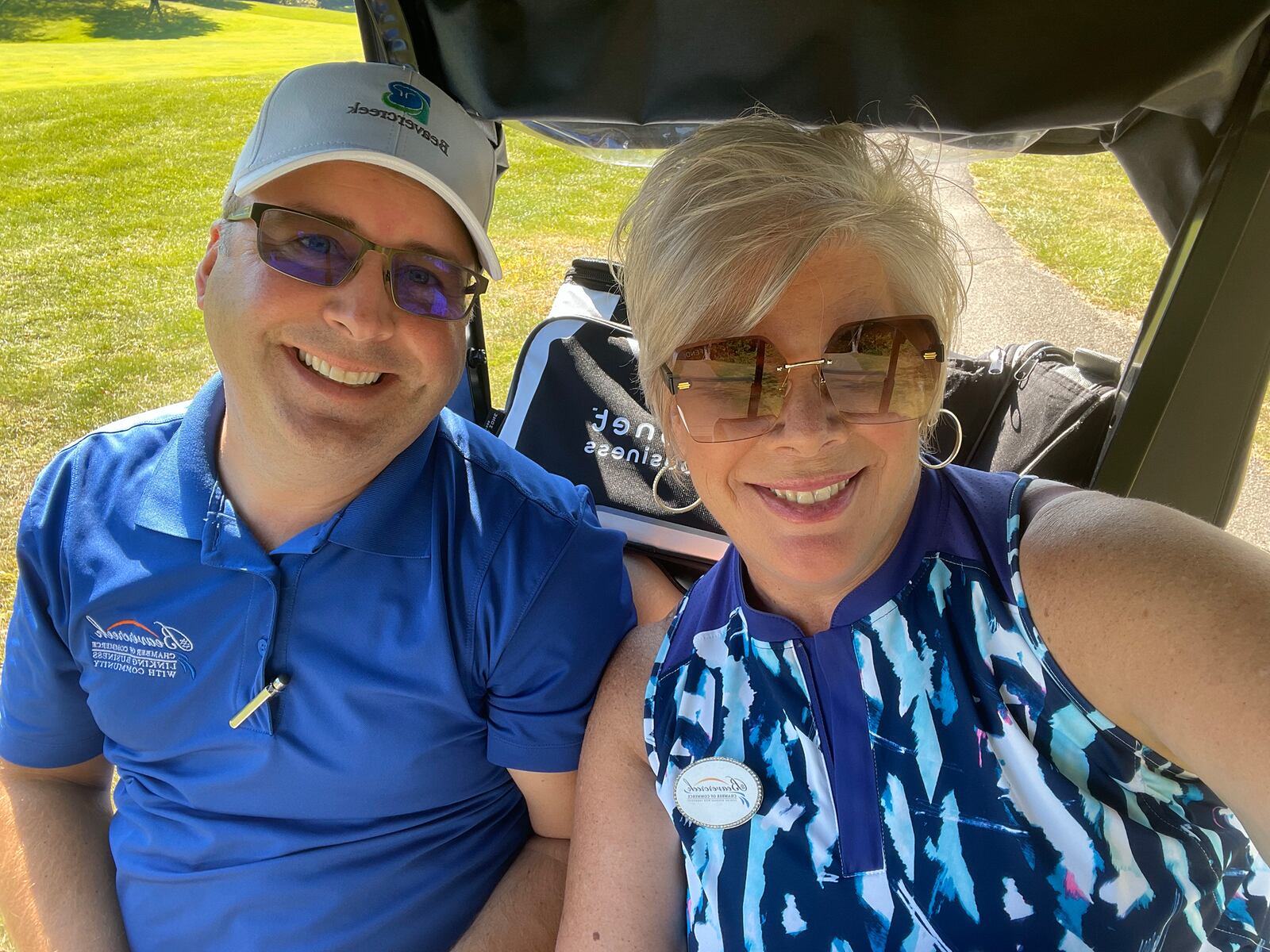 Rodgers (R) with the chamber vice president, Chris McClure at the chamber golf outing in 2023.