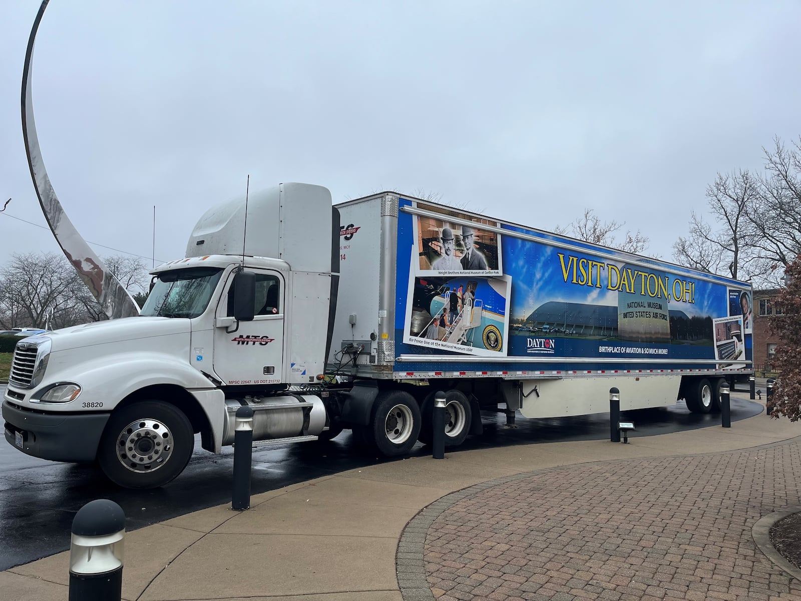 Images promoting Dayton have been added to the sides of a semi-trailer that belongs to MTS that is expected to travel about 100,000 miles across the nation each year. CORNELIUS FROLIK / STAFF