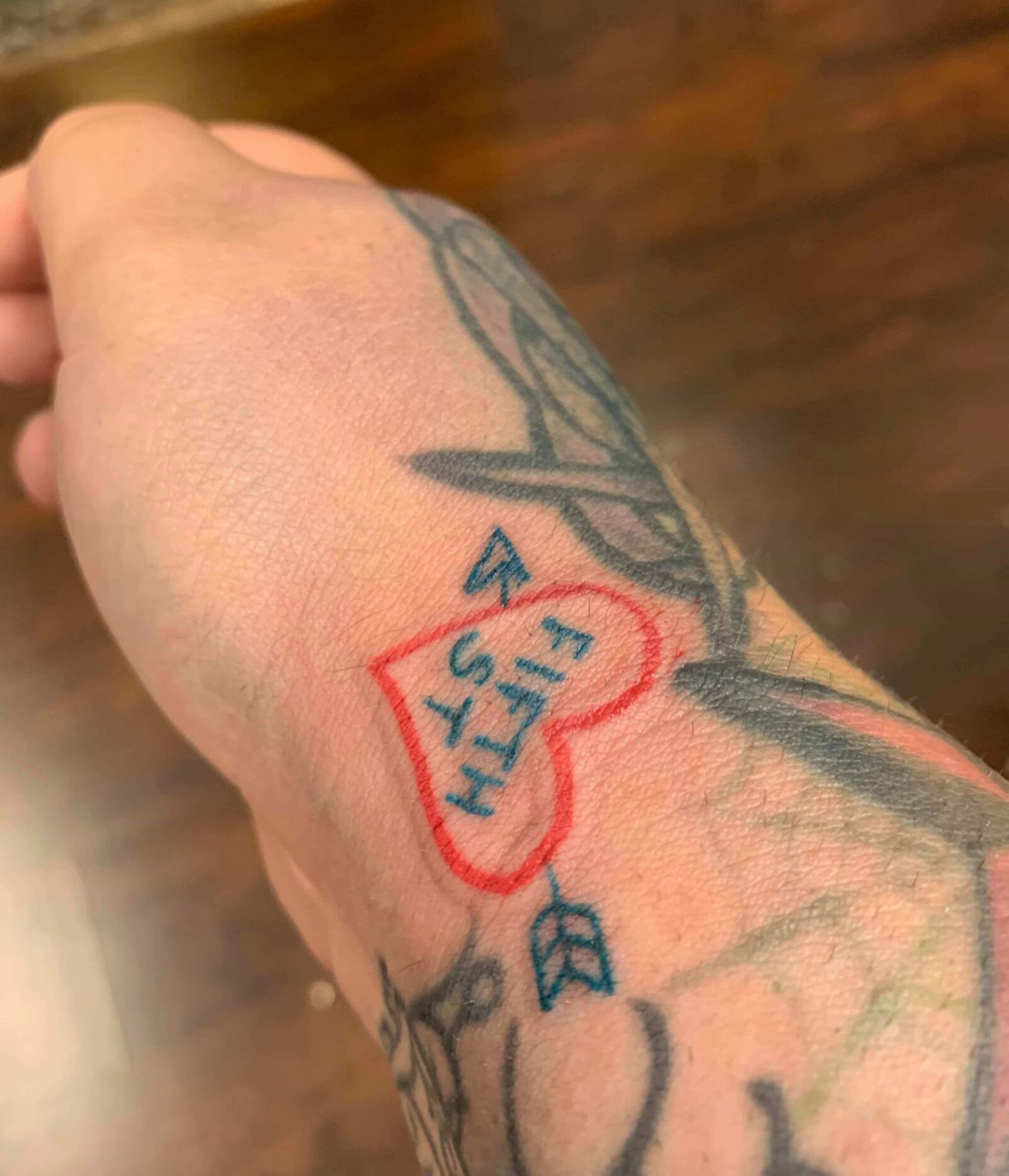 Since the Aug. 4 shooting in the Oregon District, local residents have flocked to local tattoo parlors to get some type of love note to Dayton. CONTRIBUTED