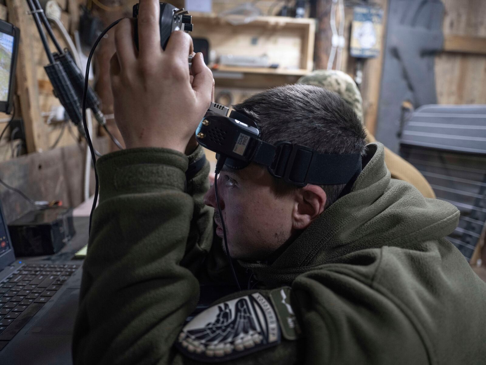 In this photo provided by Ukraine's 93rd Kholodnyi Yar Separate Mechanized Brigade press service, a soldier operates an FPV drone in a shelter in Kramatorsk direction, Donetsk region, Ukraine, Saturday, March 22, 2025. (Iryna Rybakova/Ukraine's 93rd Mechanized Brigade via AP)