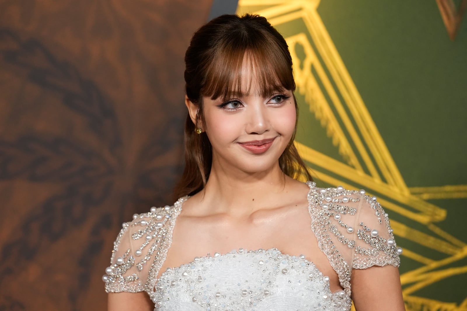 Lisa arrives at the season three premiere of "The White Lotus" on Monday, Feb. 10, 2025, at Paramount Theater in Los Angeles. (AP Photo/Chris Pizzello)