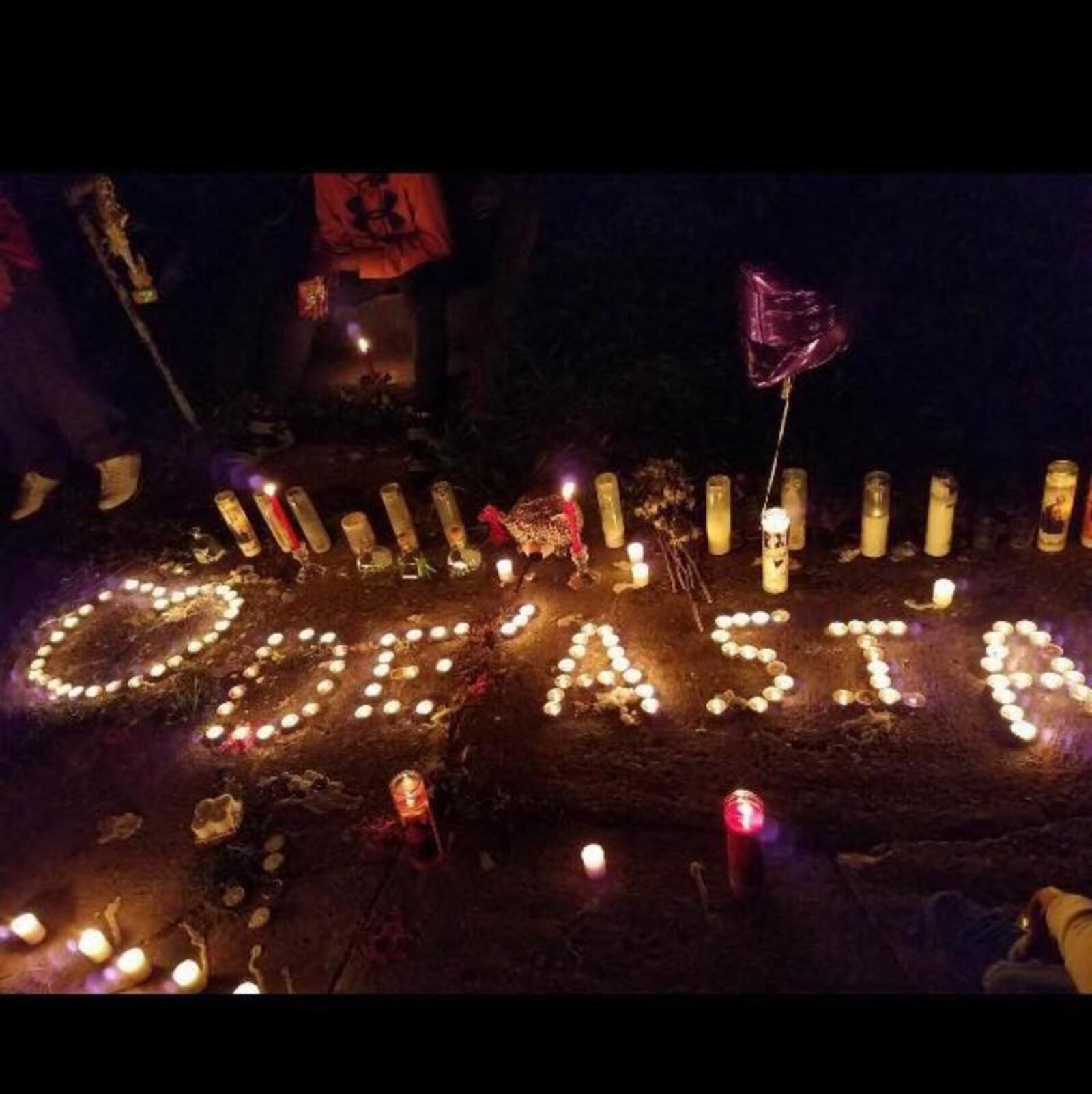 Makeshift street memorial for 20 year old De’Asia Wallace who was killed in September of 2017 when a 16-year-old boy  shot into the crowd during a street brawl in Toledo. A 15 year old girl was also wounded. Wallace is the cousin of Miami basketball standout Dalonte Brown. CONTRIBUTED