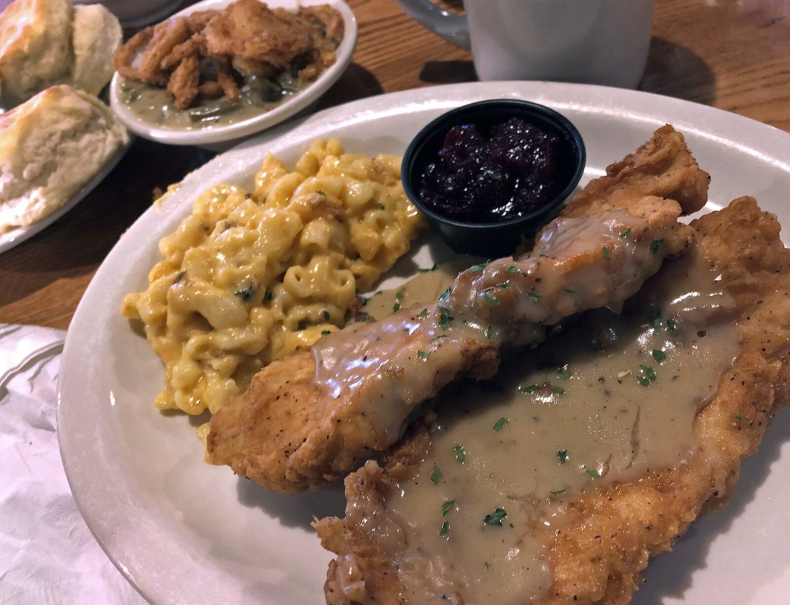 Country fried turkey with macaroni and cheese and green bean casserole at Cracker Barrel. BILL LACKEY/STAFF