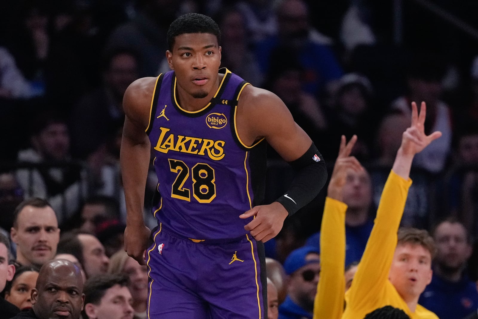 Los Angeles Lakers' Rui Hachimura (28) reacts after making a three-point shot during the first half of an NBA basketball game against the New York Knicks Saturday, Feb. 1, 2025, in New York. (AP Photo/Frank Franklin II)