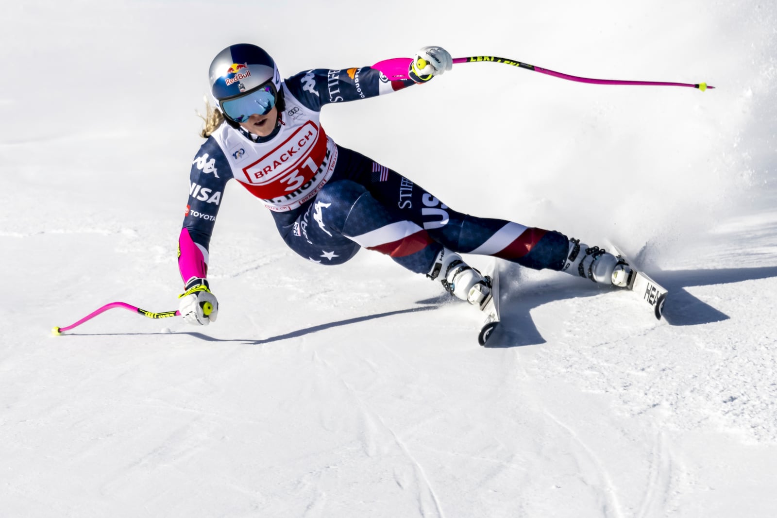 United States' Lindsey Vonn competes in an alpine ski, women's World Cup super G, in St. Moritz, Switzerland, Saturday, Dec. 21, 2024.(Jean-Christophe Bott/Keystone via AP)