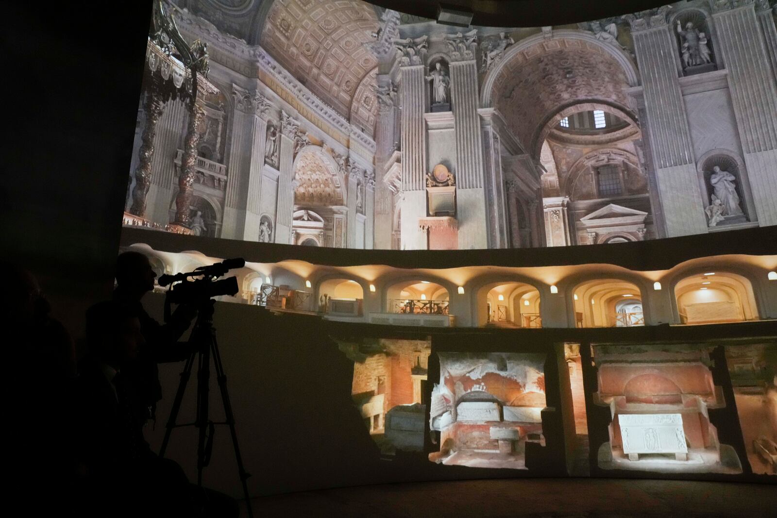 Images of St. Peter's Basilca are projected on a screen during the preview to the press of the exhibition 'Petros eni', which is part of the project "St. Peter's Basilica: AI-Enhanced Experience" at the Vatican, Saturday, Nov. 9, 2024. (AP Photo/Gregorio Borgia)