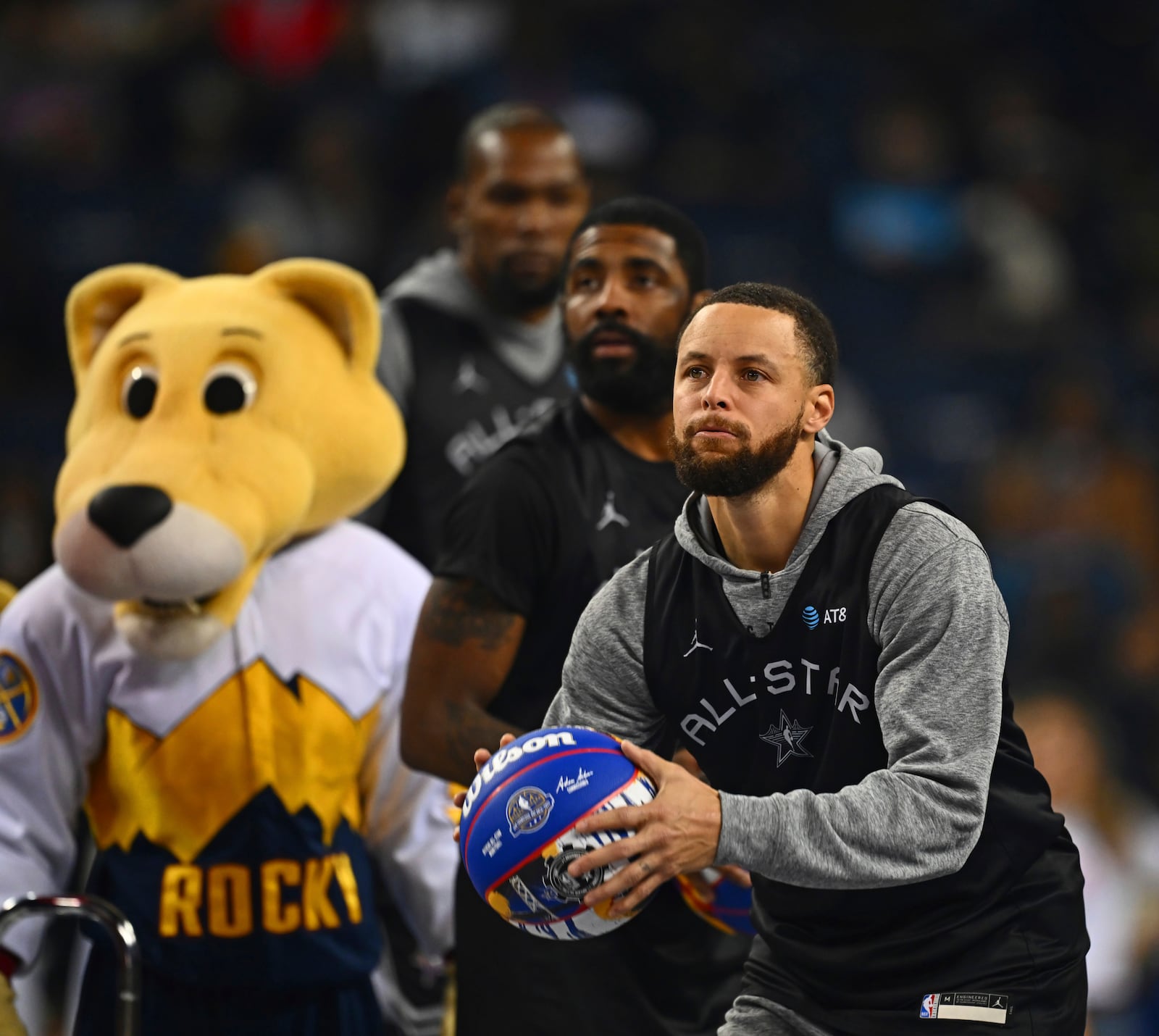 Golden State Warriors' Stephen Curry shoots from half-court during practice for the NBA All-Star basketball game, Saturday, Feb. 15, 2025, in Oakland, Calif. (Jose Carlos Fajardo/Bay Area News Group via AP)