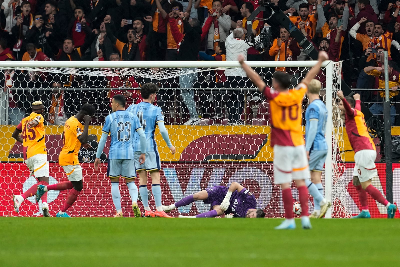 Galatasaray's Yunus Akgun , not seen in the picture scores his side's first goal during the Europa League opening phase soccer match between Galatasaray and Tottenham Hotspur at Ali Sami Yen stadium, in Istanbul, Turkey, Thursday, Nov. 7, 2024. (AP Photo/Khalil Hamra)