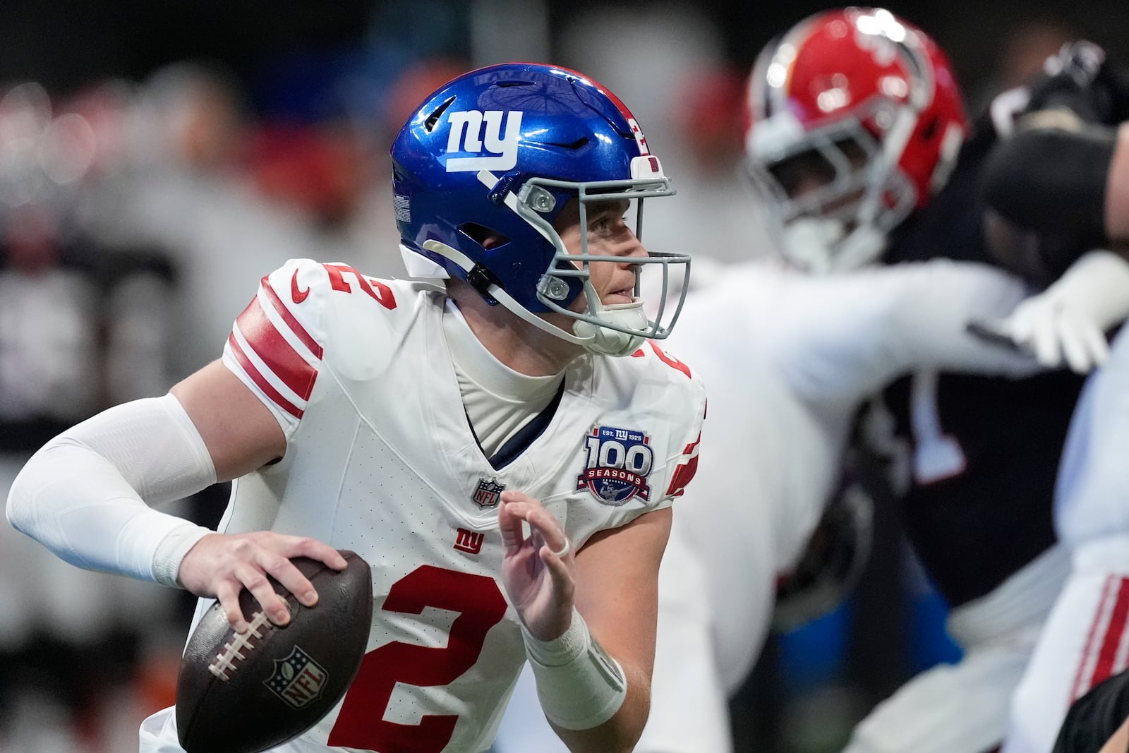 New York Giants quarterback Drew Lock (2) looks to pass in the first half of an NFL football game against the Atlanta Falcons in Atlanta, Sunday, Dec. 22, 2024. (AP Photo/John Bazemore)