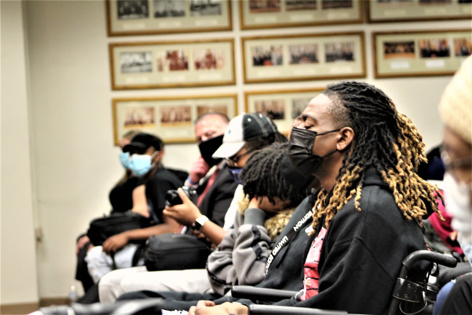 Clifford Owensby in the front row of the Dayton City Commission meeting on Wednesday. CORNELIUS FROLIK / STAFF