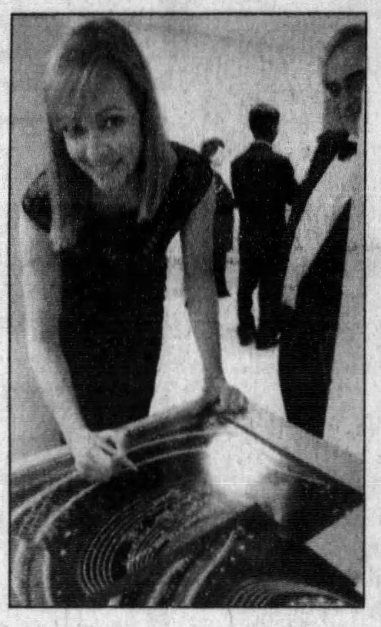 West Wing star Allison Janney signs posters backstage during the opening night of the Schuster Center in 2003. DAYTON DAILY NEWS ARCHIVES.