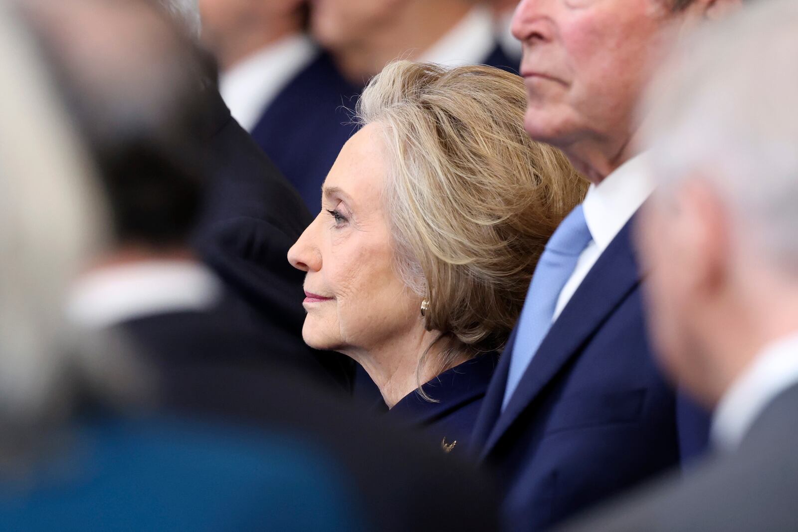 Former Secretary of State Hillary Clinton stands before the 60th Presidential Inauguration in the Rotunda of the U.S. Capitol in Washington, Monday, Jan. 20, 2025. (Kevin Lamarque/Pool Photo via AP)