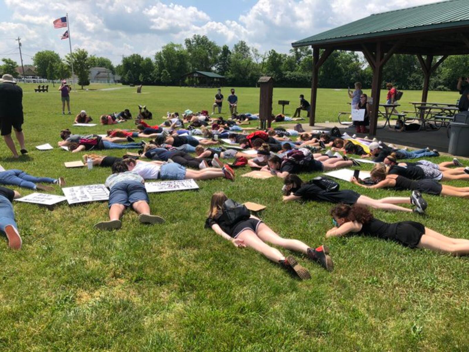 Protesters in Carlisle laid on ground for eight minutes at Roscoe Park on Saturday, June 6, 2020, in protest after the death of George Floyd in Minnesota. RICK McCRABB / STAFF