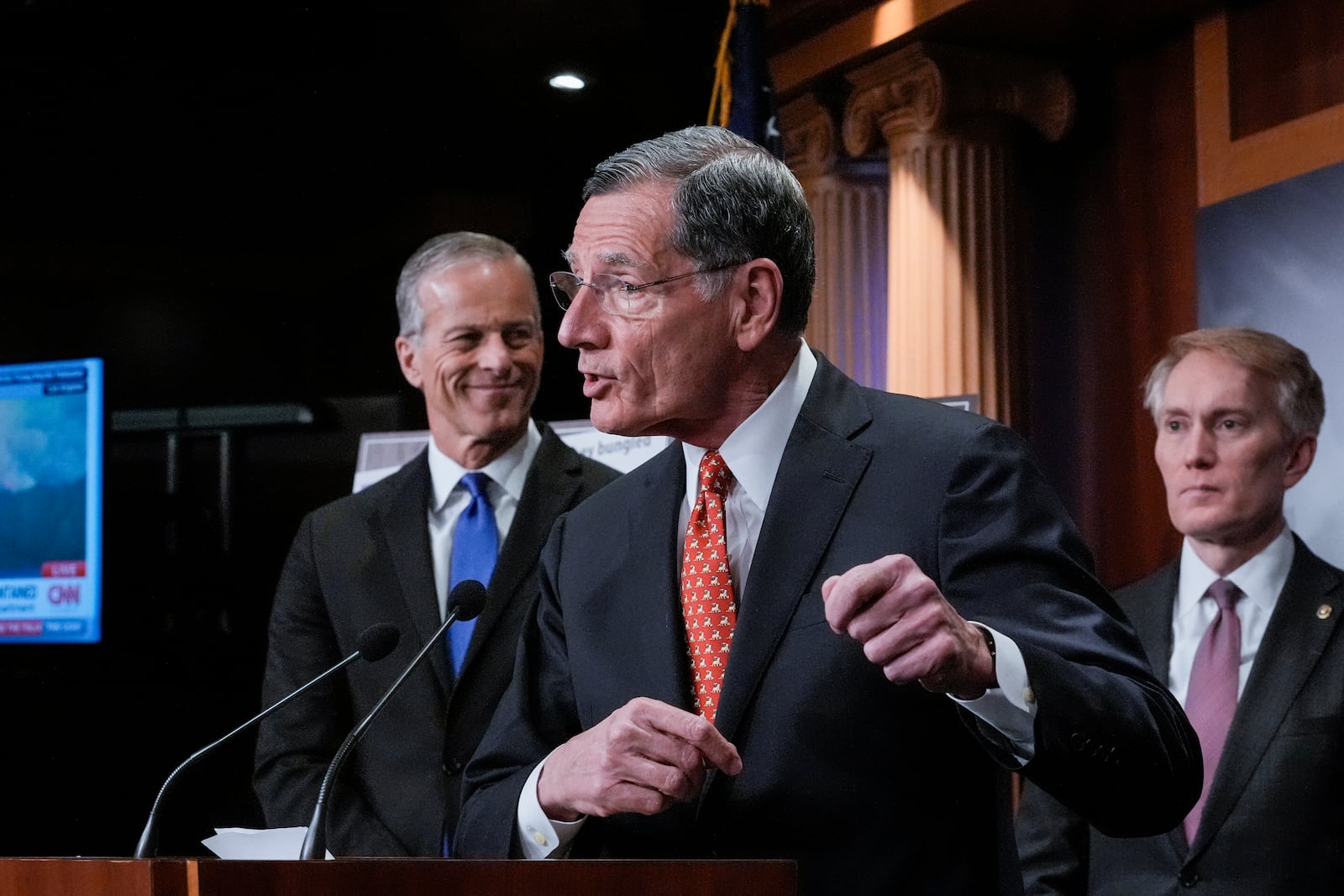 Senate Majority Whip John Barrasso, R-Wyo., center, flanked by Senate Majority Leader John Thune, R-S.D., left, and Sen. James Lankford, R-Okla., speaks to reporters about the Laken Riley Act, a bill to detain unauthorized immigrants who have been accused of certain crimes, at the Capitol in Washington, Thursday, Jan. 9, 2025. Georgia nursing student Laken Riley was killed last year by a Venezuelan man who entered the U.S. illegally and was allowed to stay to pursue his immigration case. (AP Photo/J. Scott Applewhite)