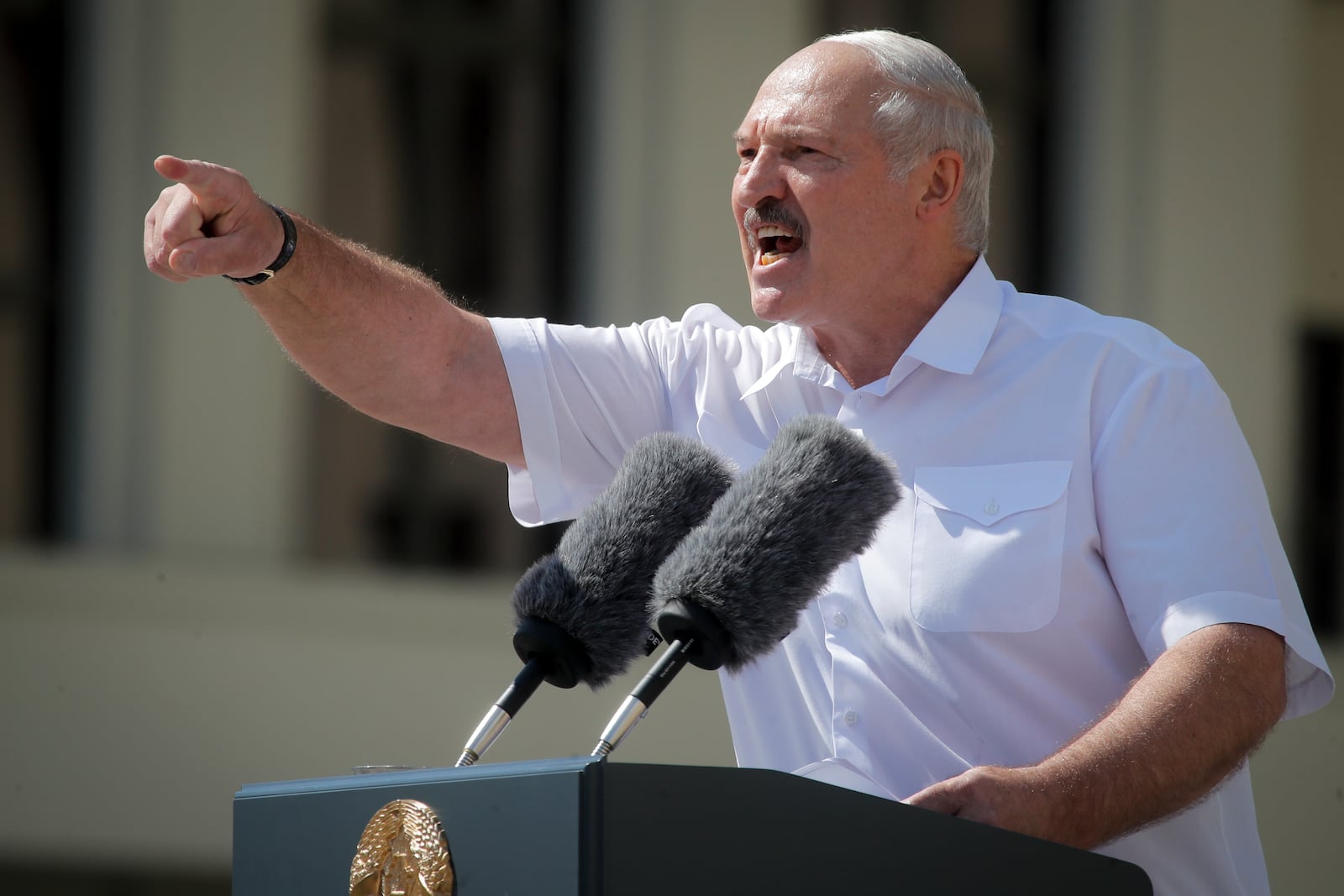 FILE - President Alexander Lukashenko gestures to supporters at Independence Square in Minsk, Belarus, on Aug. 16, 2020. (AP Photo/Dmitri Lovetsky, File)