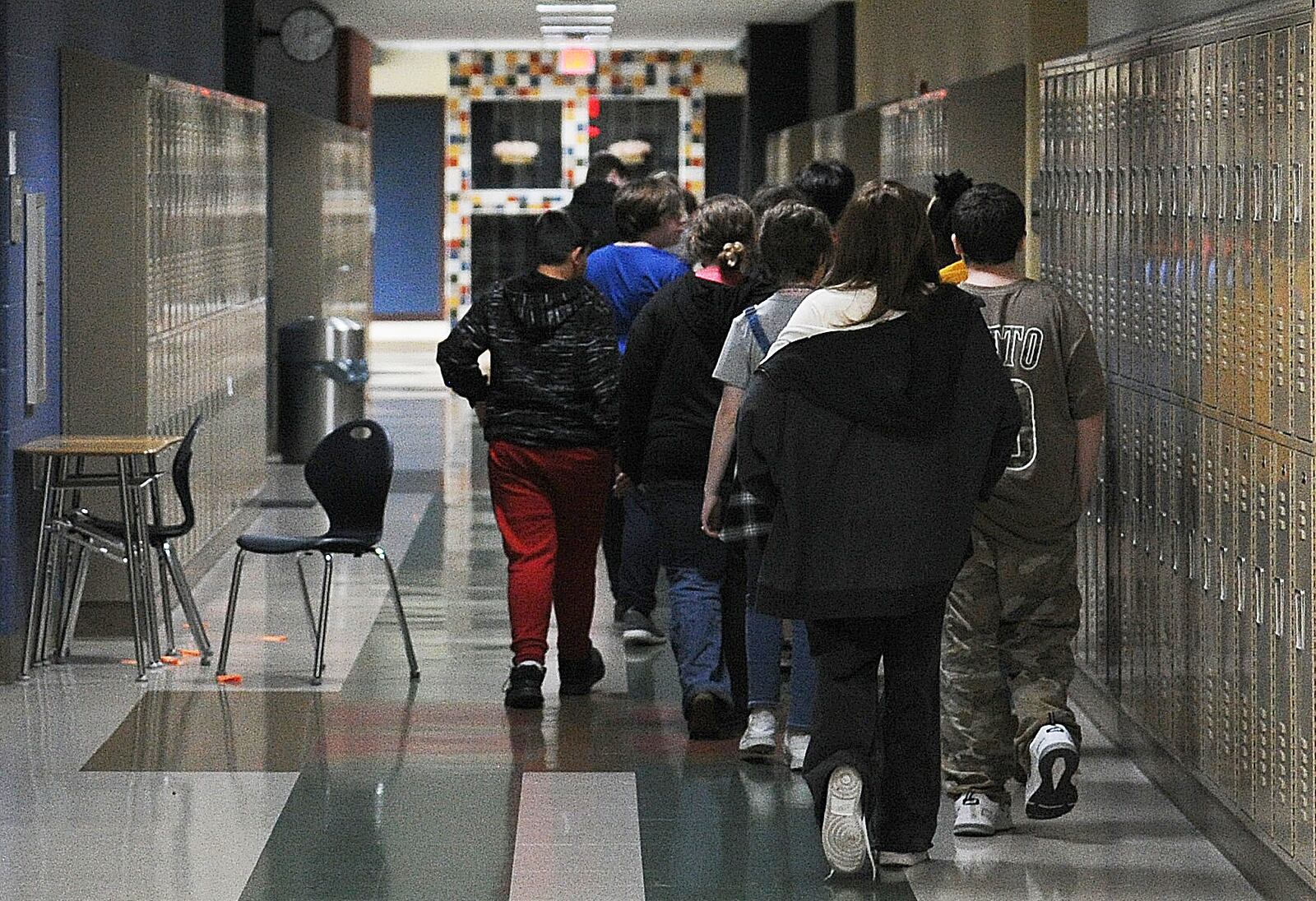 Students at Miamisburg Middle School walk through the hallways on May 5. Miamisburg is one of the schools in the region who have added mental health staff and are working to support students and teachers after a difficult two years. School and hospital officials are concerned about teen's mental health across the Miami Valley. Marshall Gorby \ Staff 