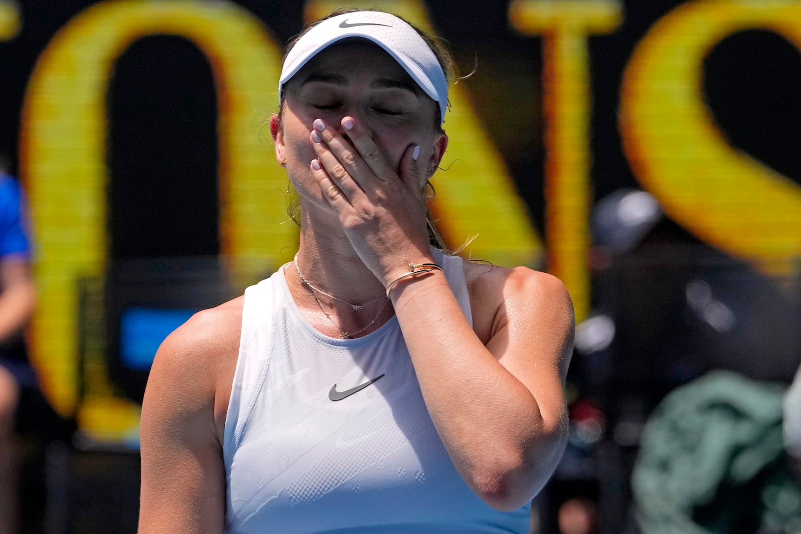 Paula Badosa of Spain celebrates after defeating Coco Gauff of the U.S. during their quarterfinal match at the Australian Open tennis championship in Melbourne, Australia, Tuesday, Jan. 21, 2025. (AP Photo/Manish Swarup)