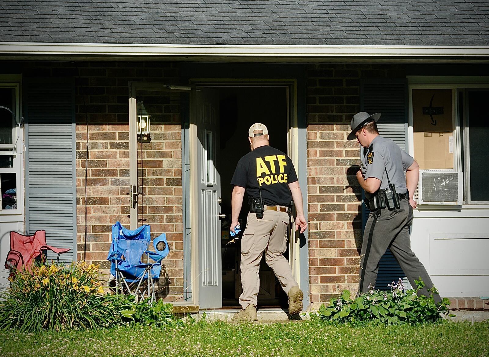 Xenia police, Ohio State Highway Patrol and Bureau of Alcohol, Tobacco and Firearms responded to a house on Colorado Drive on Thursday, June 13, 2024, for an investigation. MARSHALL GORBY/STAFF