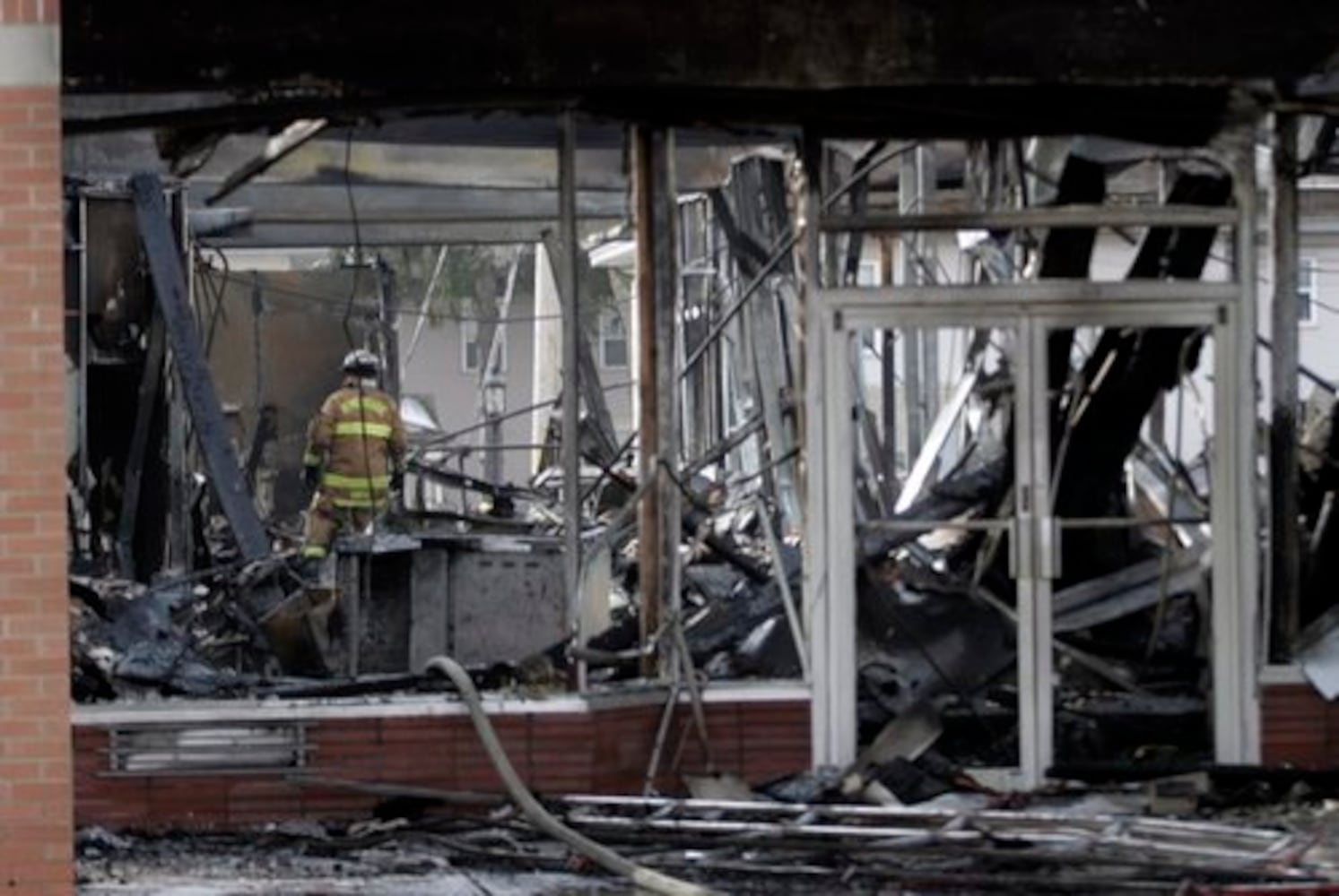 Page Manor shopping center damaged by fire