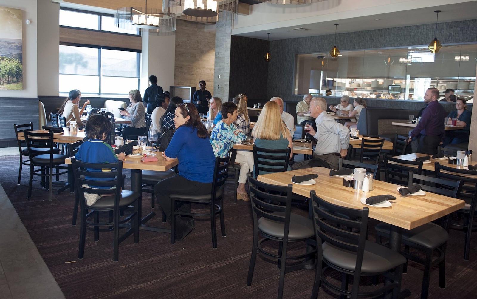 The upscale diningng room at Cooper’s Hawk restaurant at The Gardens Mall in Palm Beach Gardens is spacious, yet welcoming. (Meghan McCarthy / Palm Beach Post)