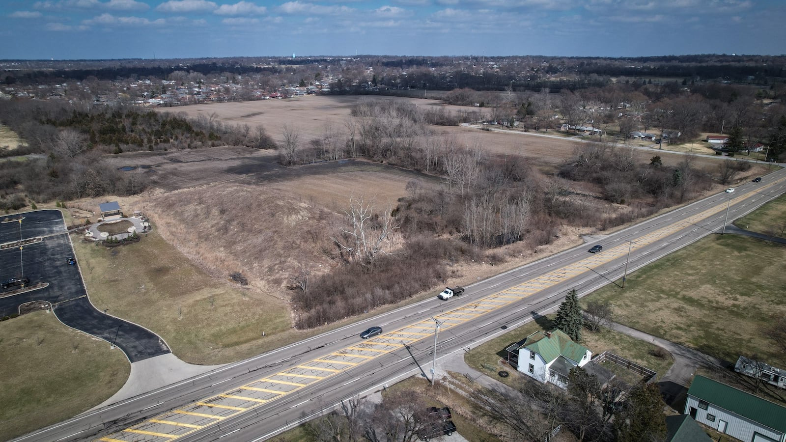 A proposed housing project is expected to bring 251 new homes to vacant land northeast of Old Troy Pike and Needmore Road -- 167 of the homes in Dayton and 84 just across the line in Riverside. The project is separate from the 256-home Willow Hills development just south of Needmore, in the same area. JIM NOELKER/STAFF