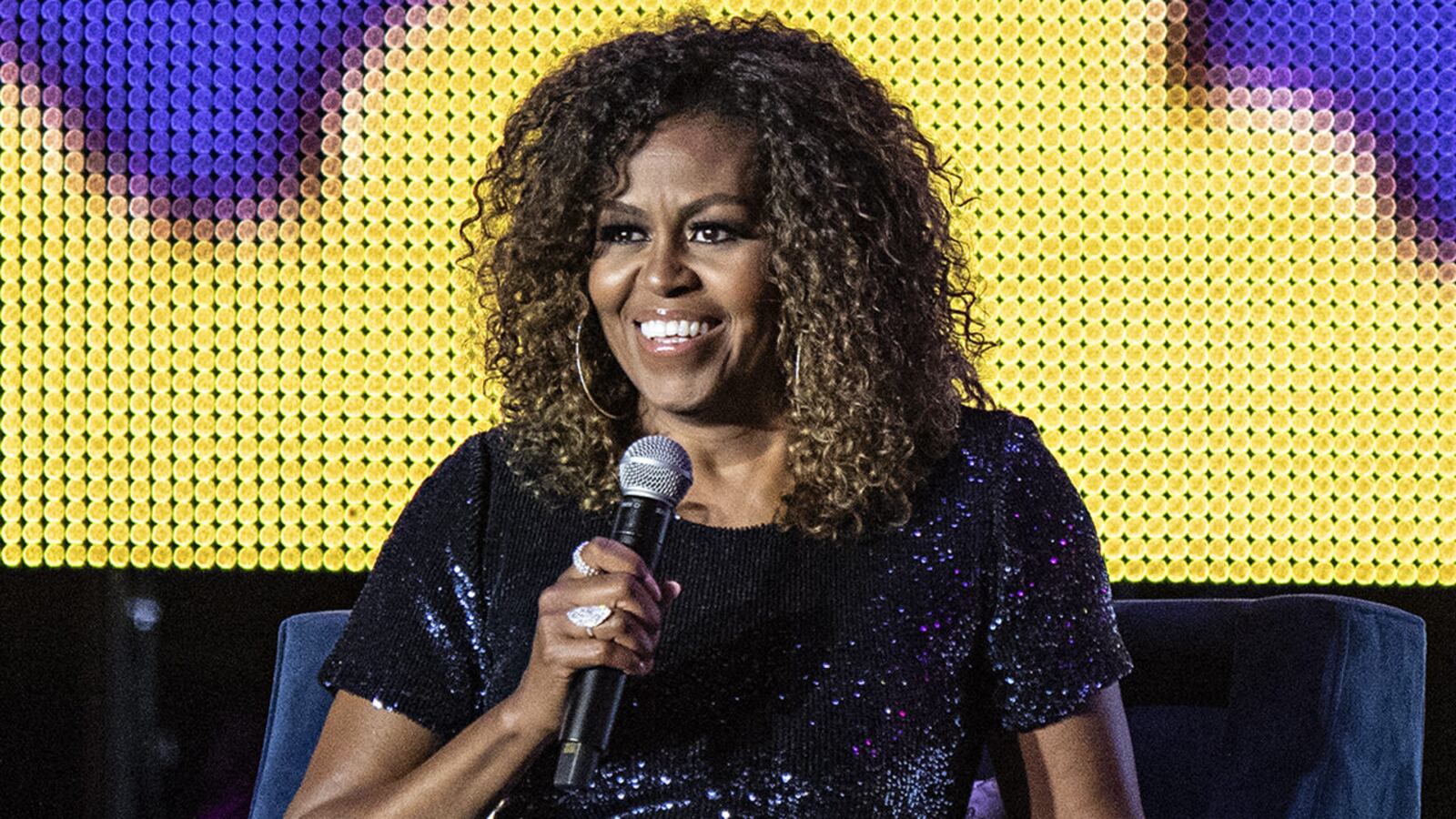 Michelle Obama and Gayle King participate in the 2019 Essence Festival at the Mercedes-Benz Superdome, Saturday, July 6, 2019, in New Orleans.