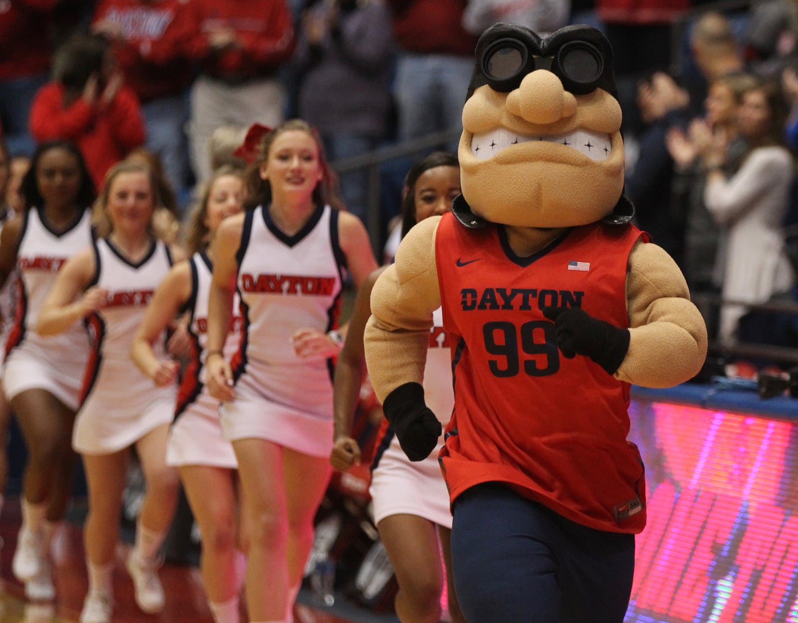 Rudy Flyer runs into the court before a Dayton game against Saint Mary's on Saturday, Nov. 19, 2016, at UD Arena. David Jablonski/Staff