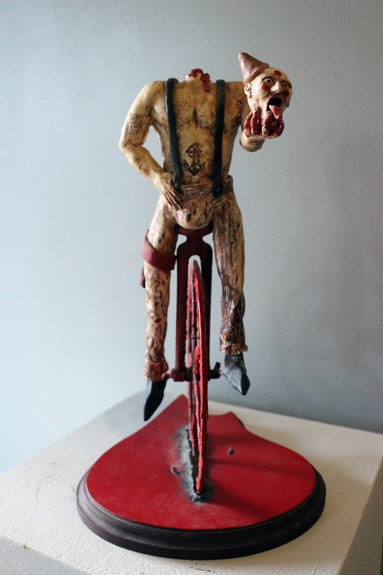 Chuck Ferrel's sculpture depicts Coulrophobia or the fear of clowns.  "For a while, I started doing a sideshow theme with snail girl, snakeboy, and the clown was the union of the sideshow," said Ferrell.  For more by this artist visit his website, Facebook, or contact via e-mail for all other inquiries.  (ALLEGRA CZERWINSKI / STAFF )