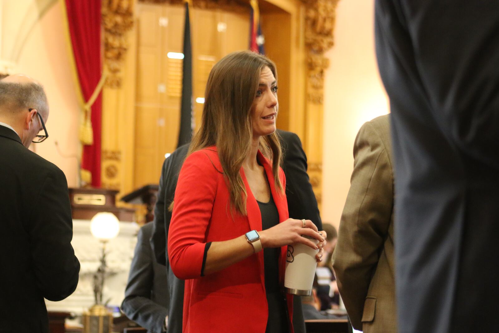 State Rep. Jena Powell, R-Arcanum, talks with state Rep. George Lang, R-West Chester. Neither are wearing masks.